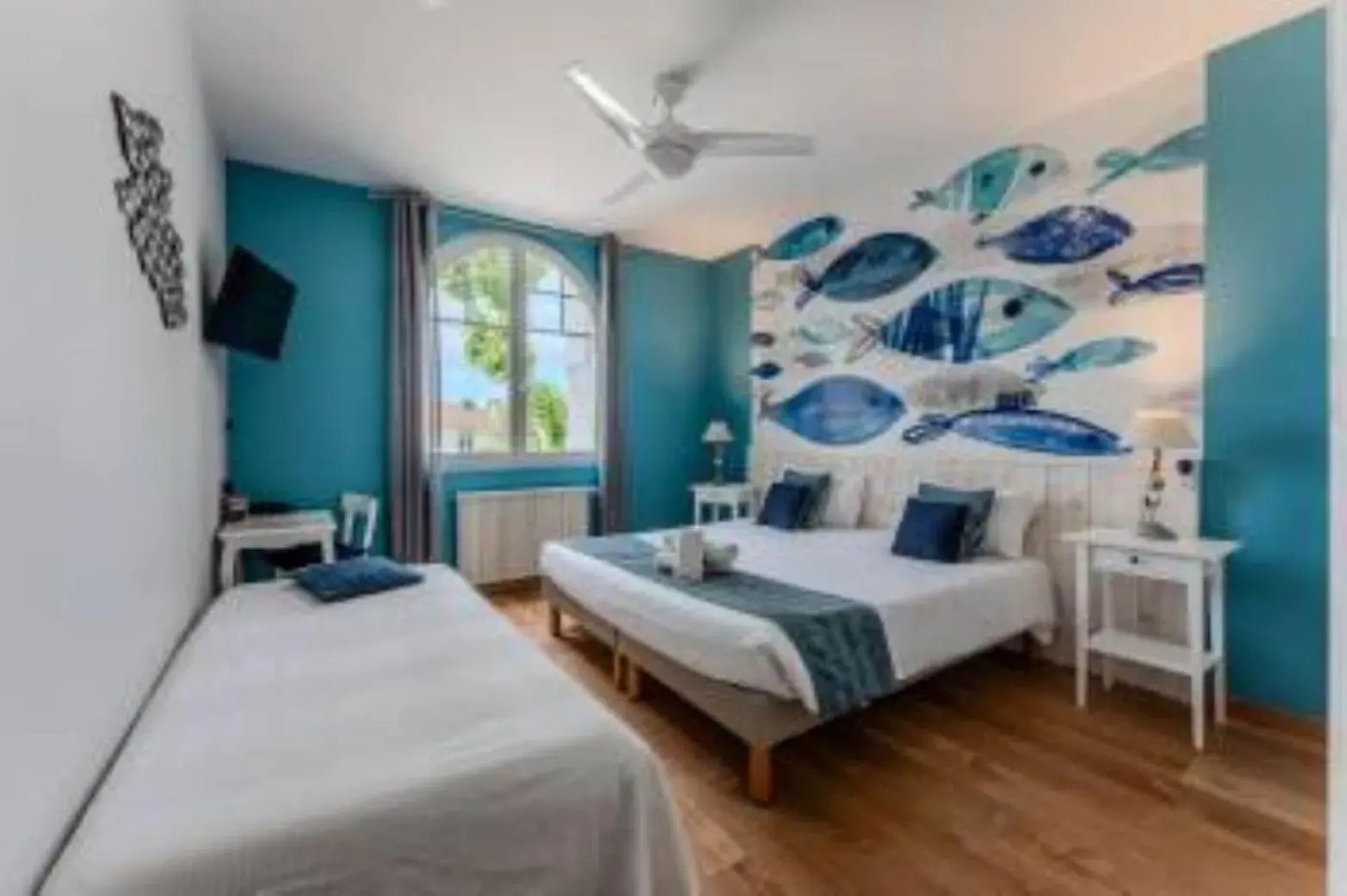 Triple Room in Hôtel Le Grain de Sable Triple Room in Hôtel Le Grain de Sable