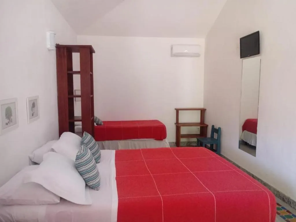 Garden view, Bed in Pousada Vila do Beco
