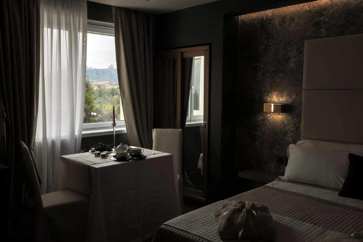 Garden view, Bed in La Vigna Hotel