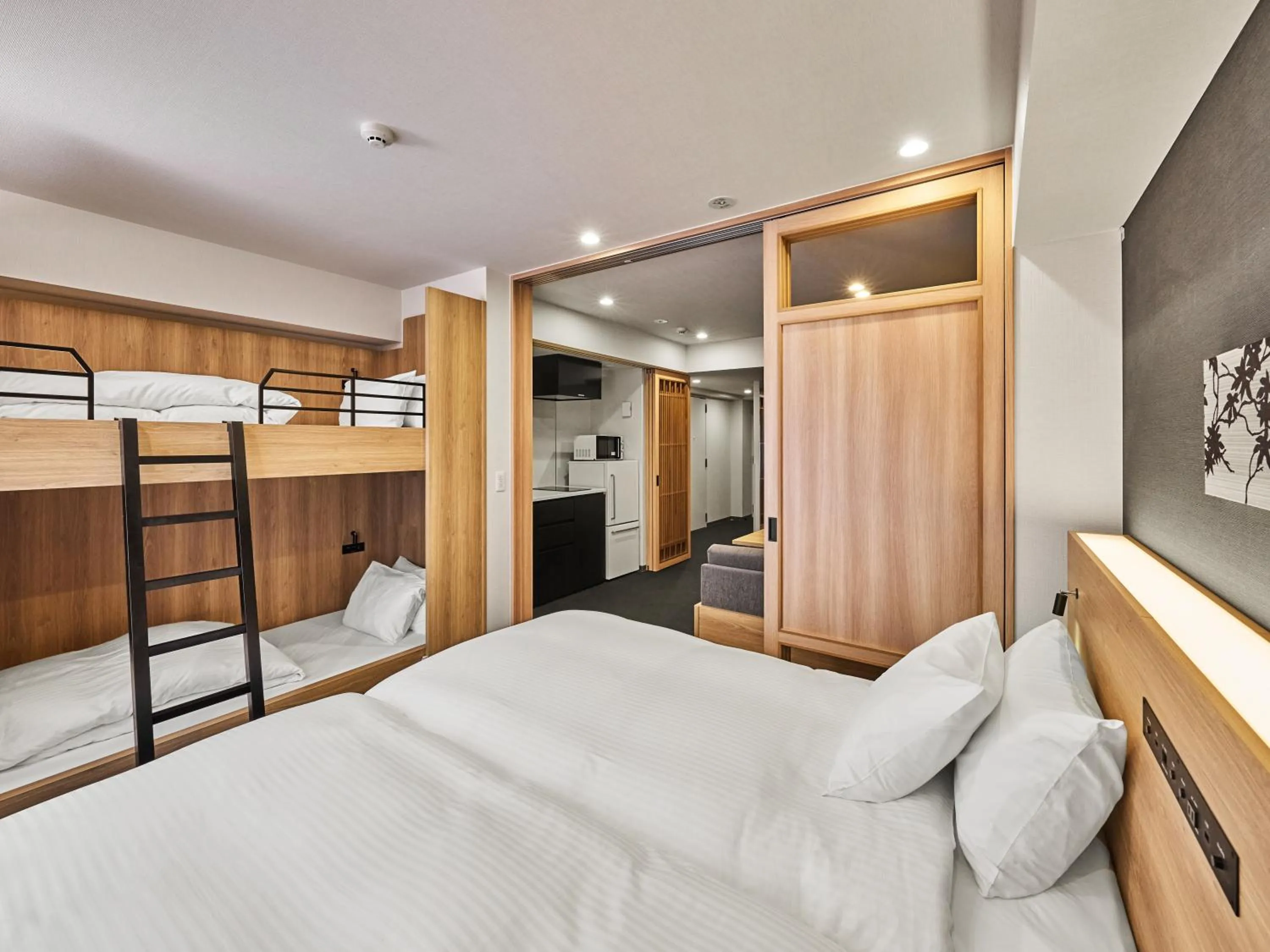 Bed in MIMARU Kyoto Shinmachi Sanjo