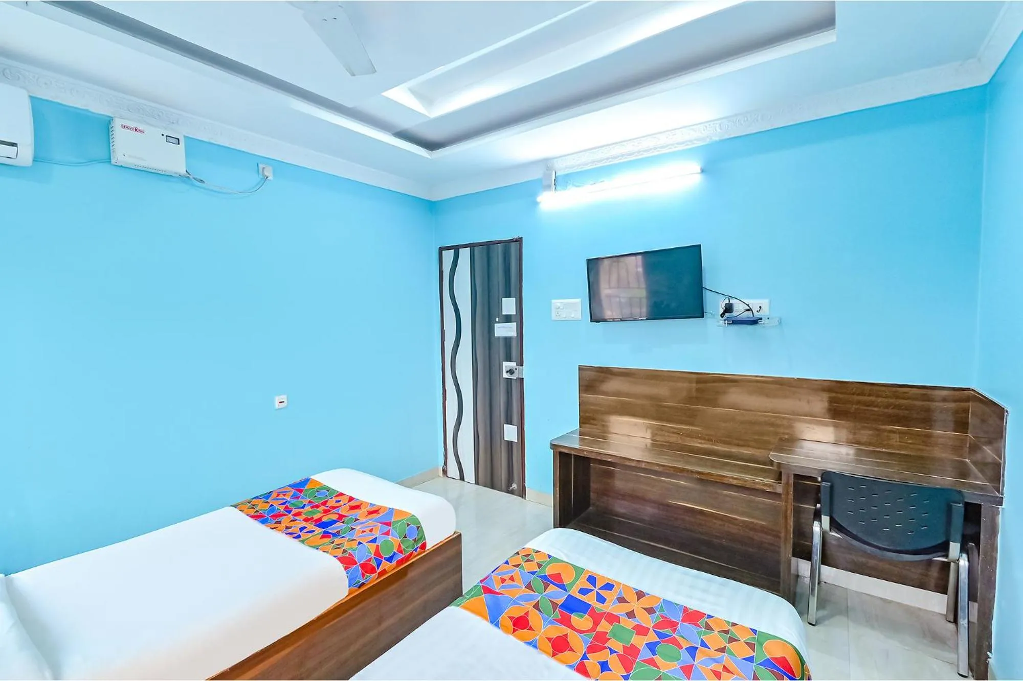 Bed in FabHotel Good Luck Residency