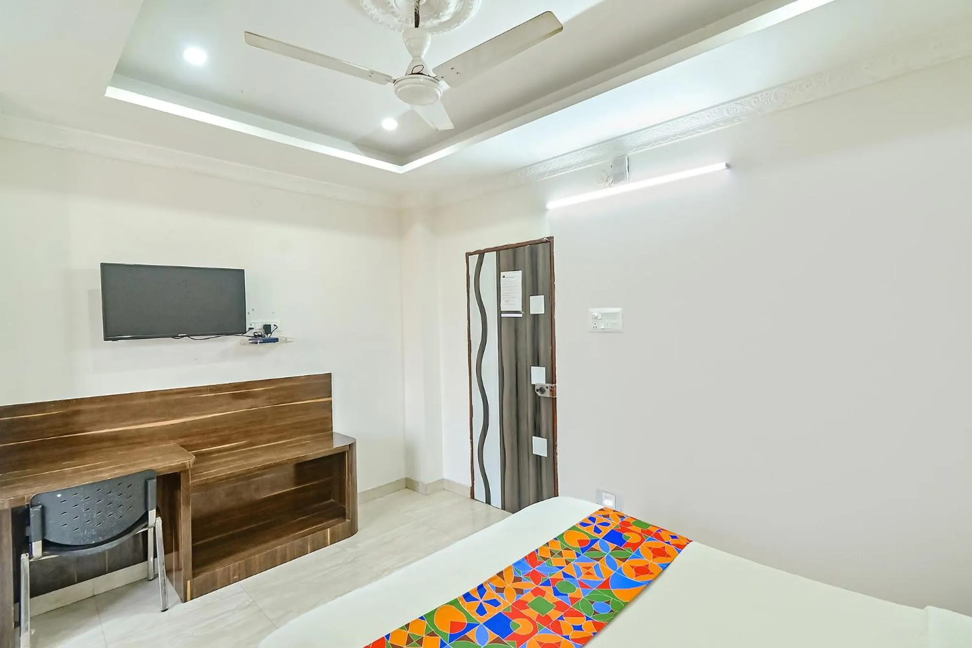 Bed in FabHotel Good Luck Residency