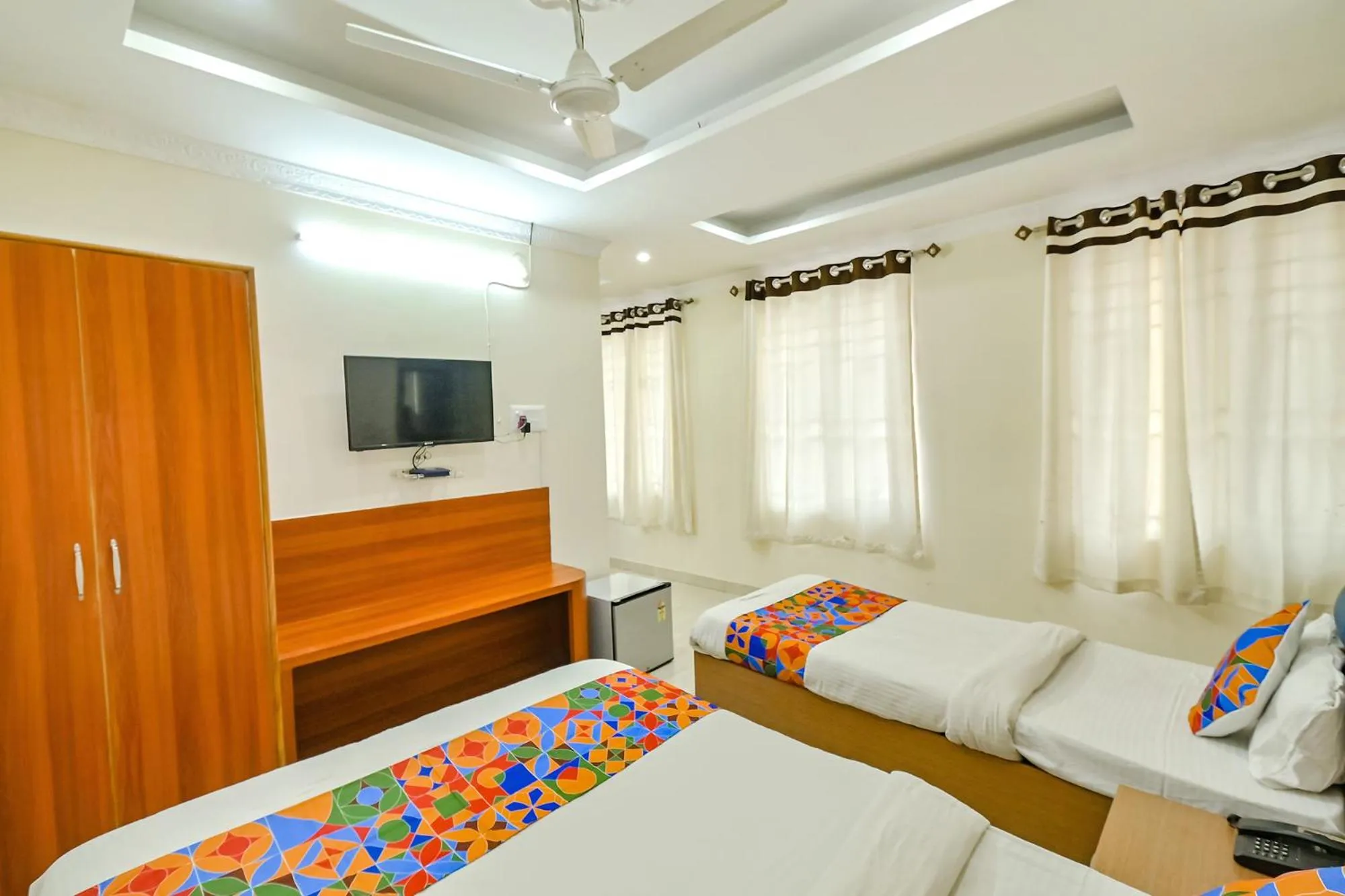 Bed in FabHotel Good Luck Residency