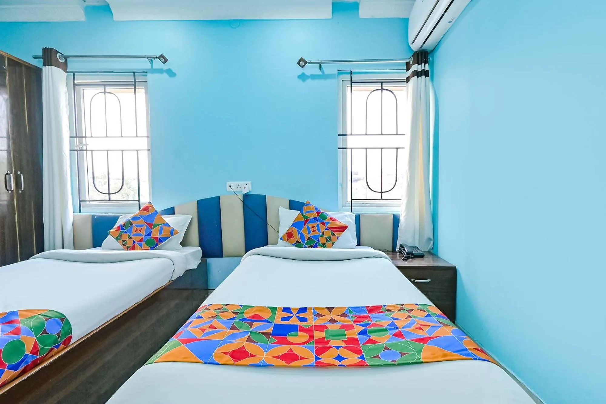 Bed in FabHotel Good Luck Residency