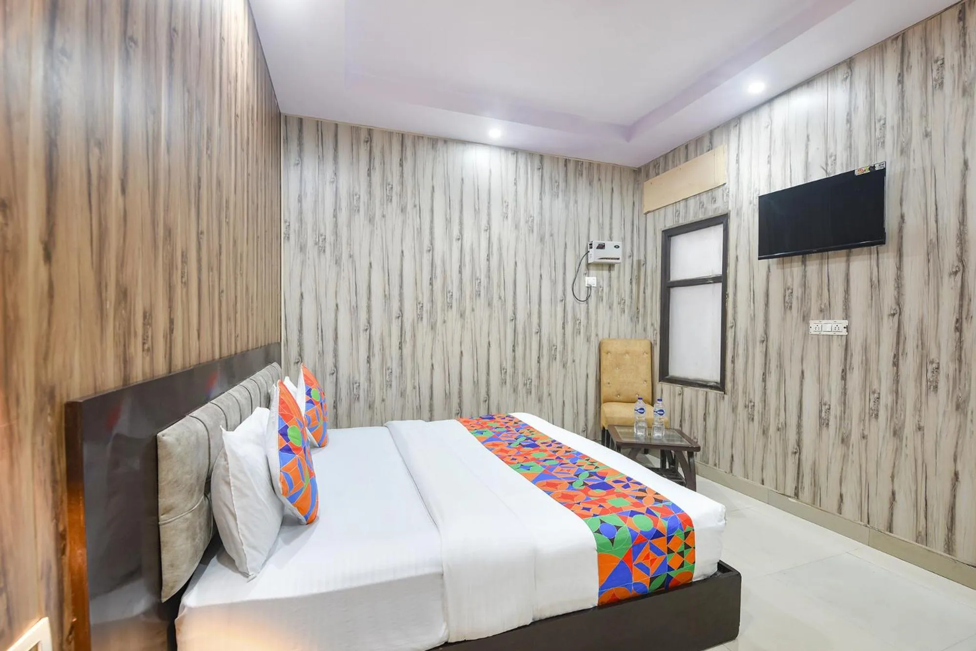 Bed in FabHotel Crown Residency