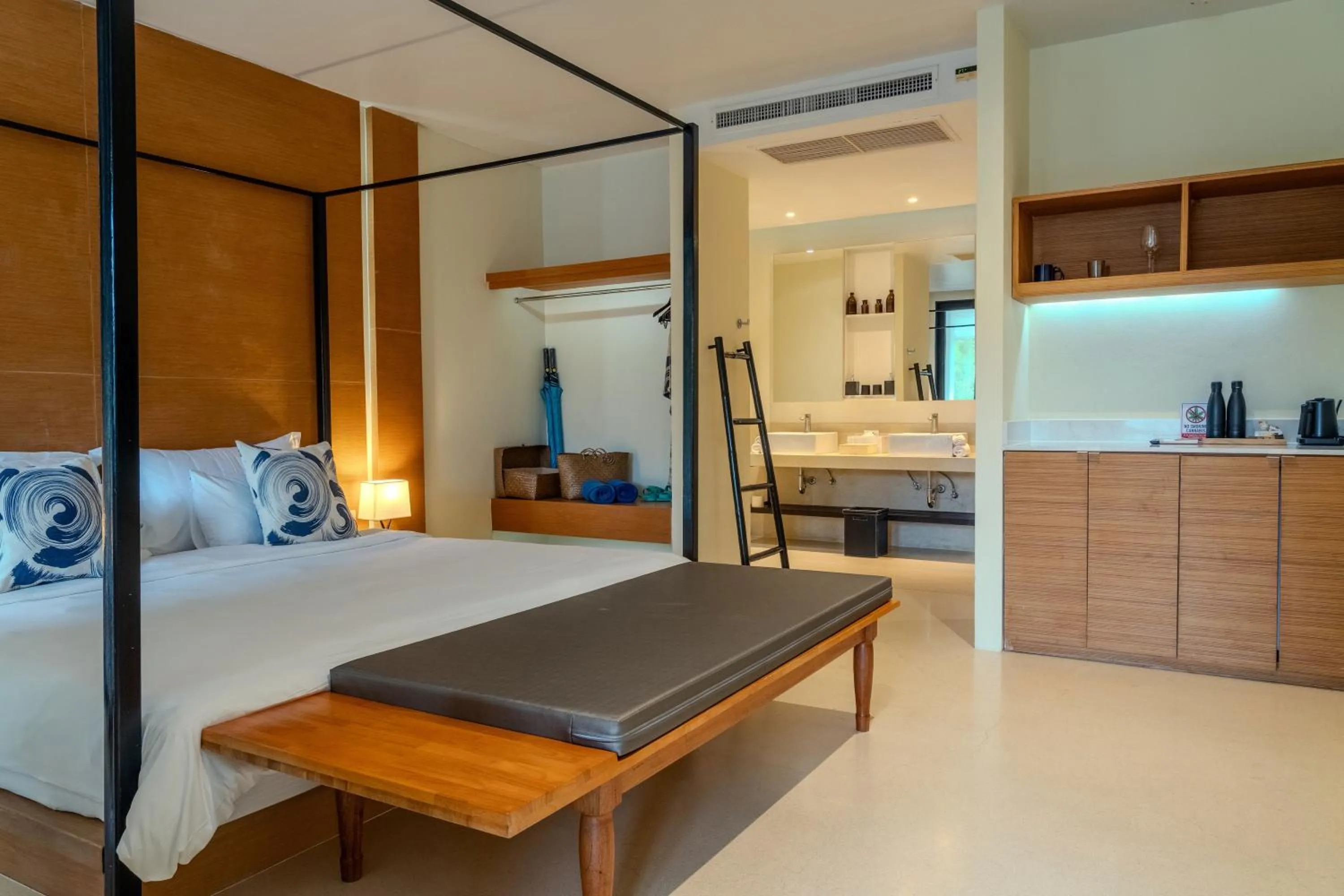 Bed in The Anda Mani Khaolak Beachfront Villas - Adult only