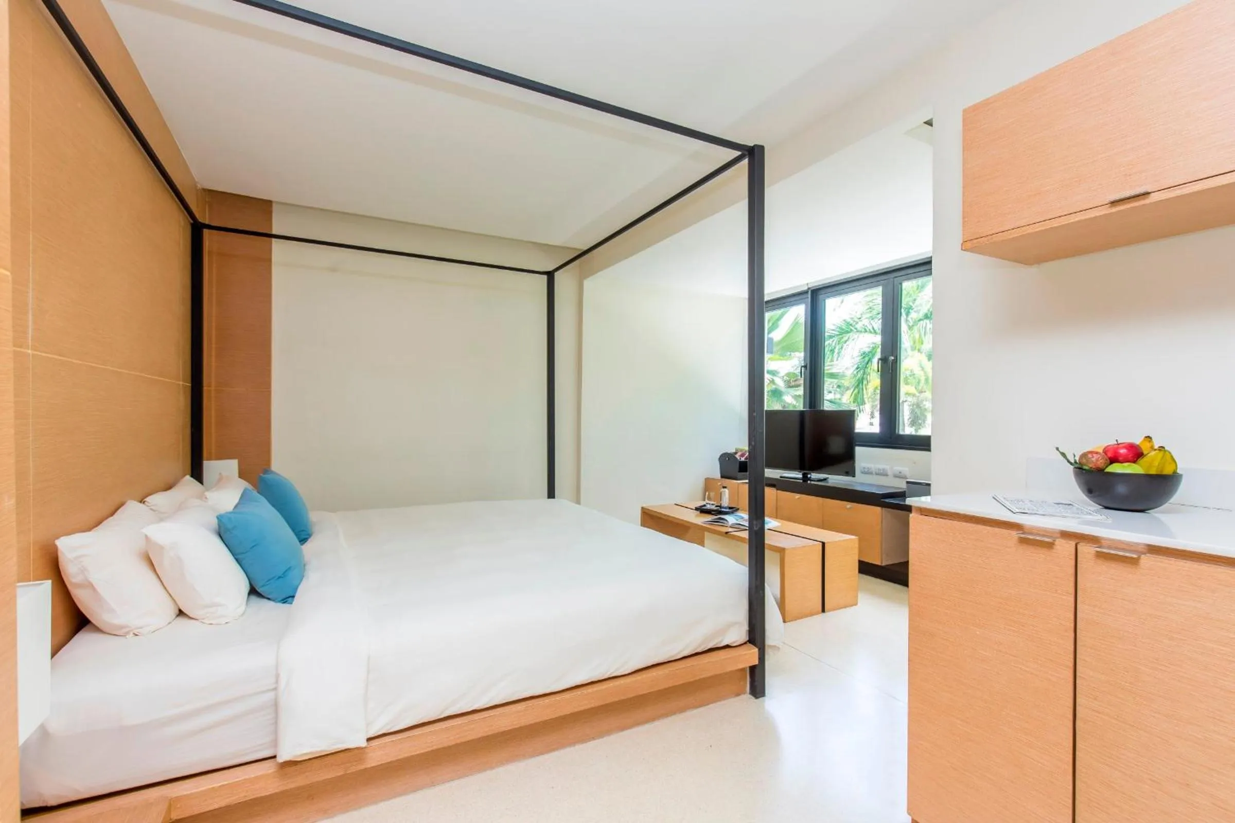 Bed in The Anda Mani Khaolak Beachfront Villas - Adult only