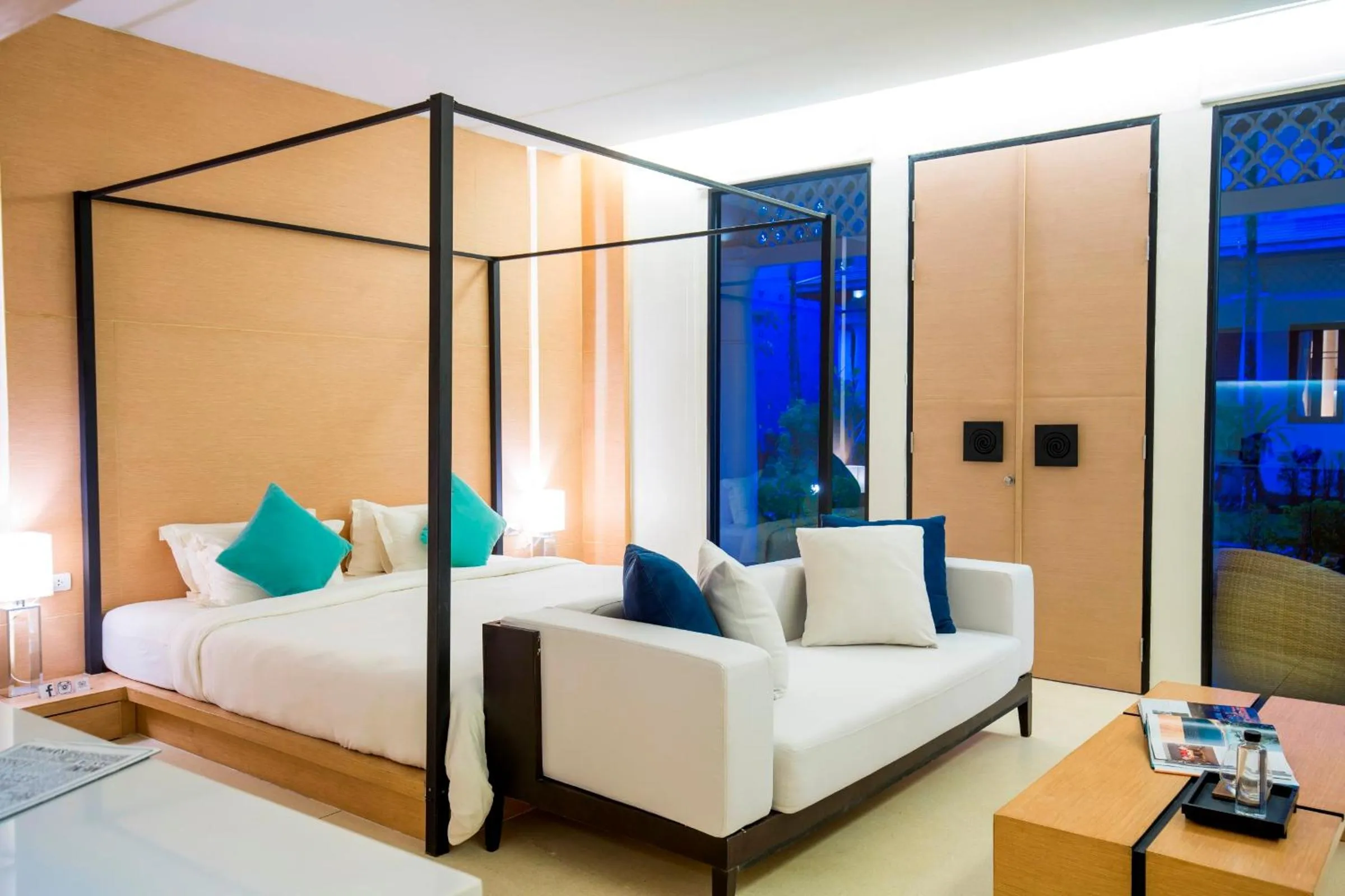 Bed in The Anda Mani Khaolak Beachfront Villas - Adult only