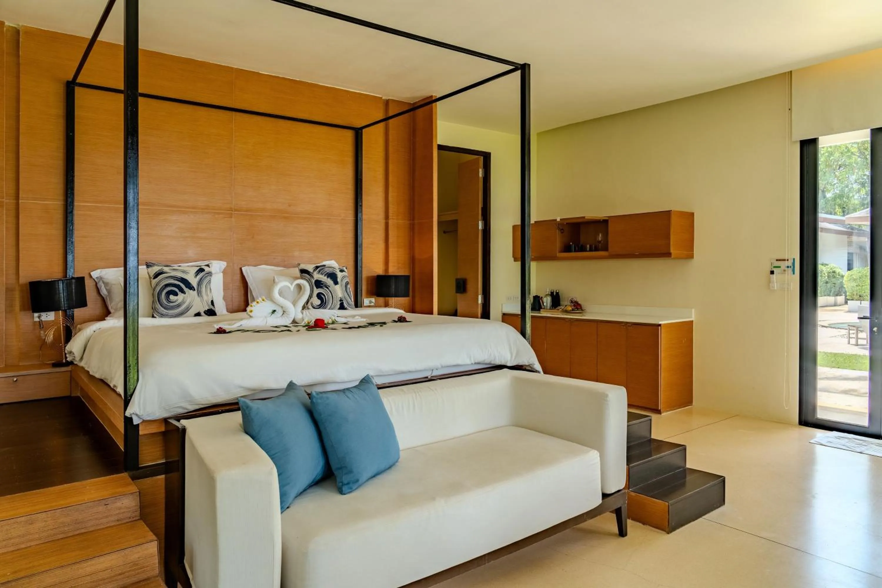 Bed in The Anda Mani Khaolak Beachfront Villas - Adult only
