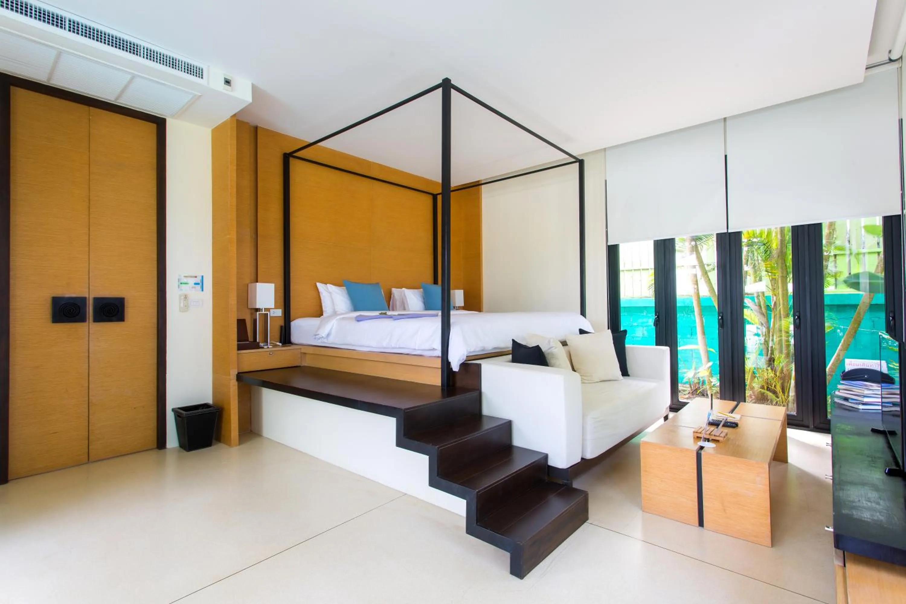 Photo of the whole room, Bed in The Anda Mani Khaolak Beachfront Villas - Adult only