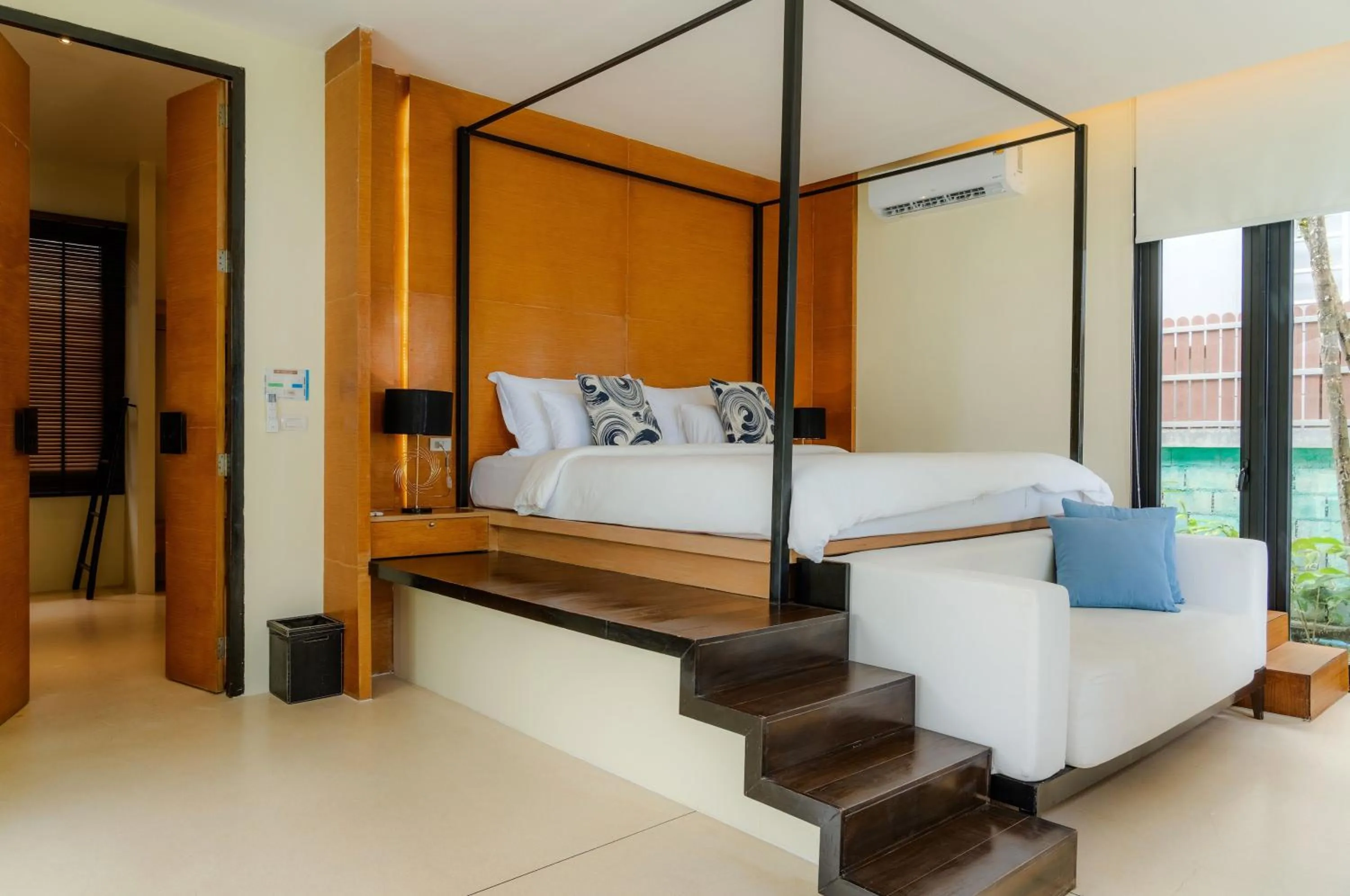Bed in The Anda Mani Khaolak Beachfront Villas - Adult only