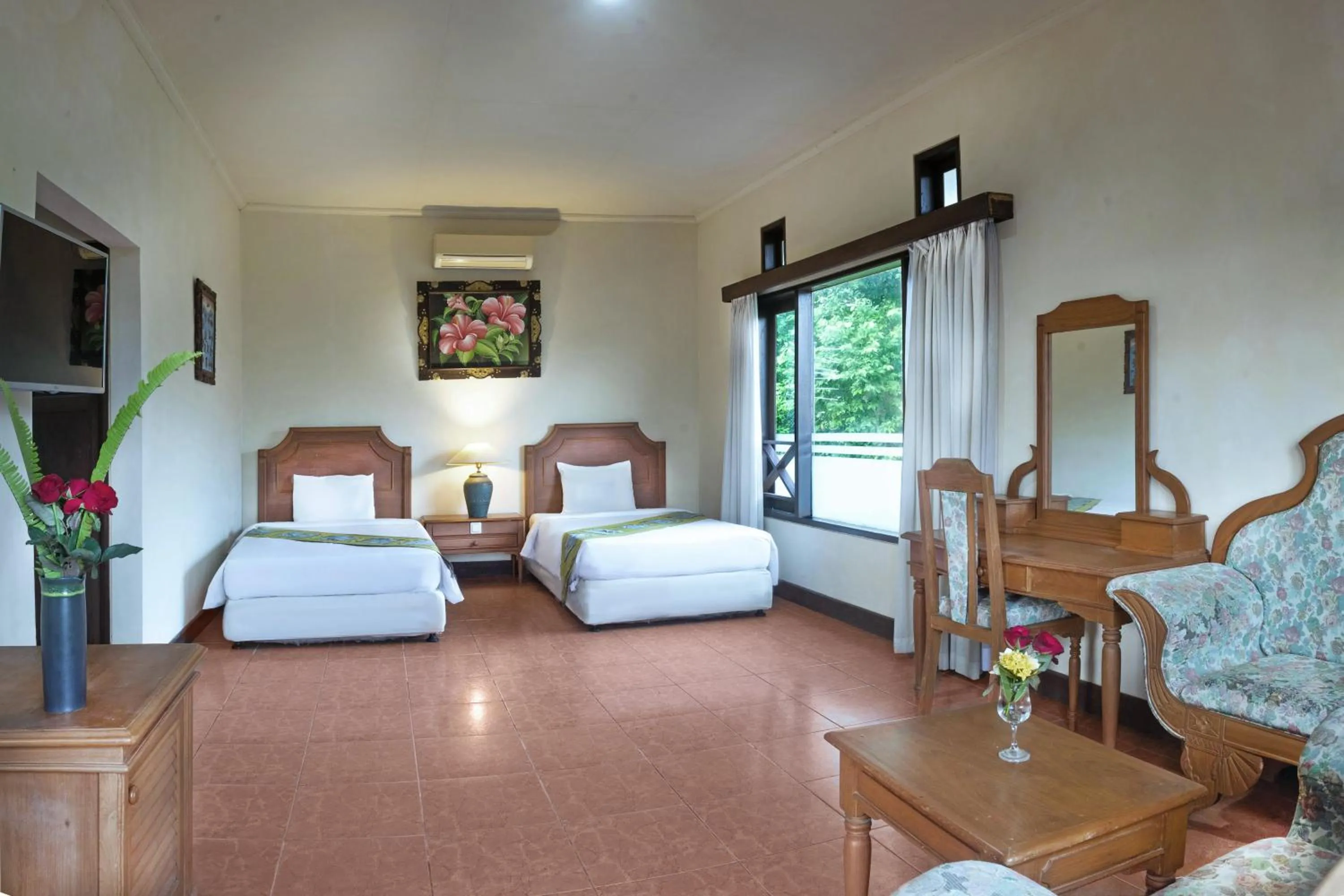 Bed in Dewi Sinta Hotel and Restaurant