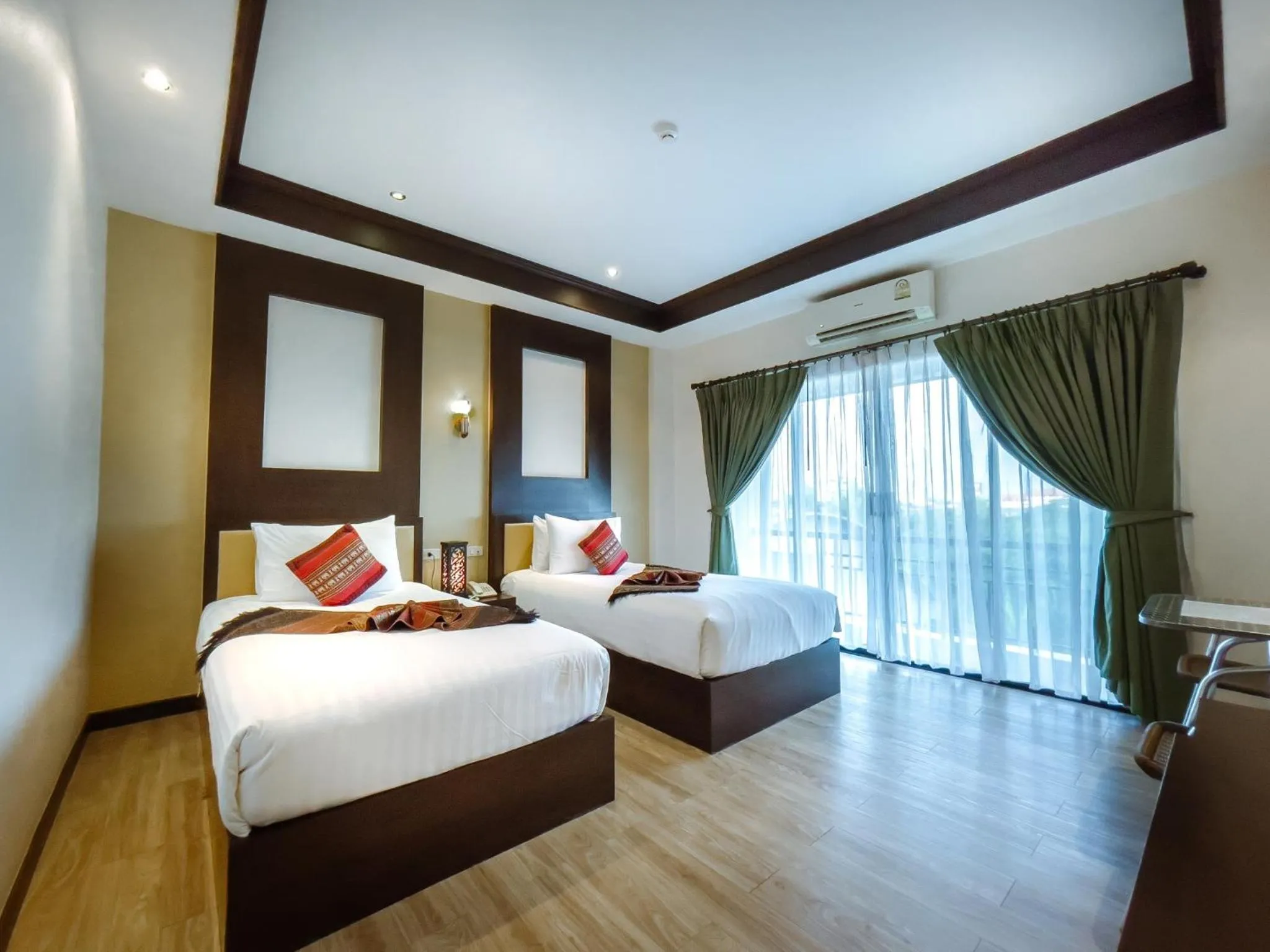 Bed in Royal Nakhara Hotel and Convention Centre