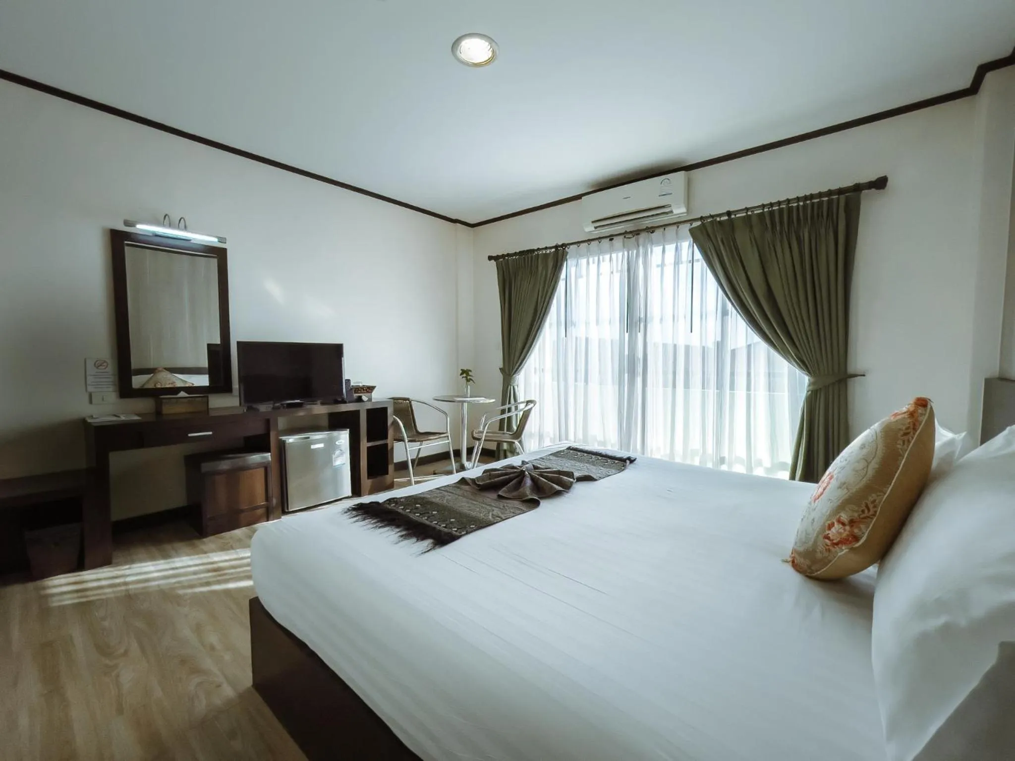 Bed in Royal Nakhara Hotel and Convention Centre