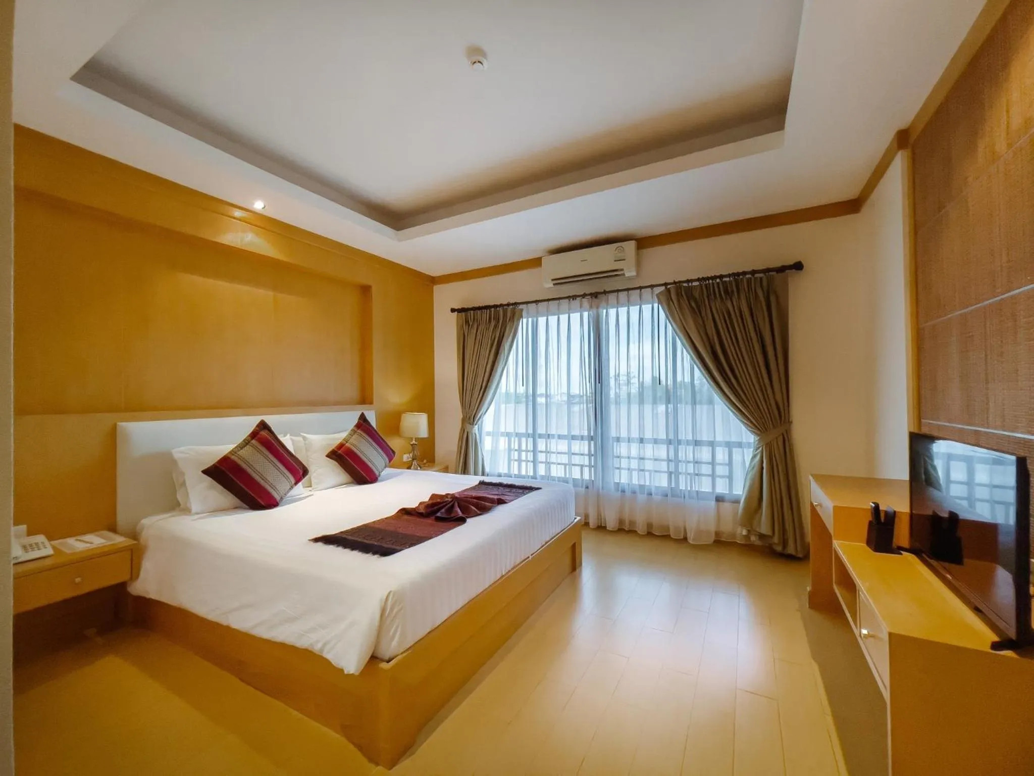 Bed in Royal Nakhara Hotel and Convention Centre