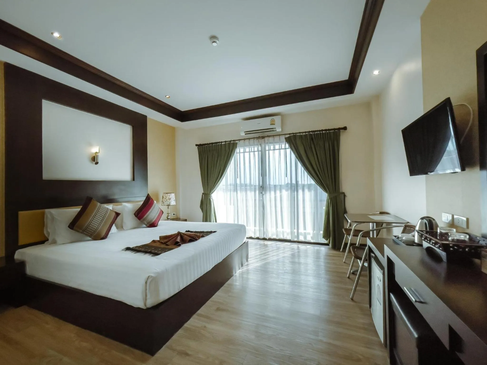 View (from property/room), Bed in Royal Nakhara Hotel and Convention Centre