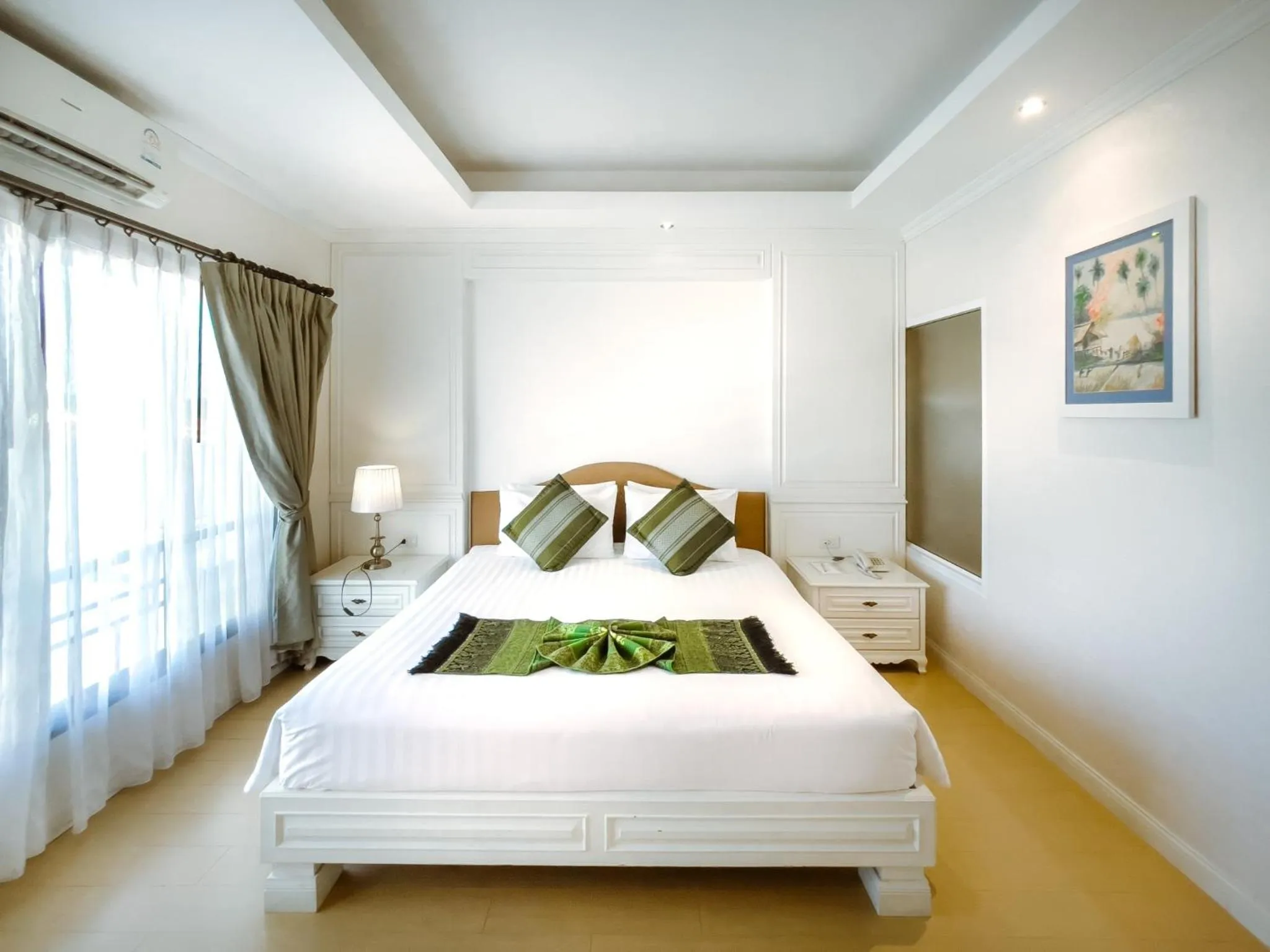 Bed in Royal Nakhara Hotel and Convention Centre