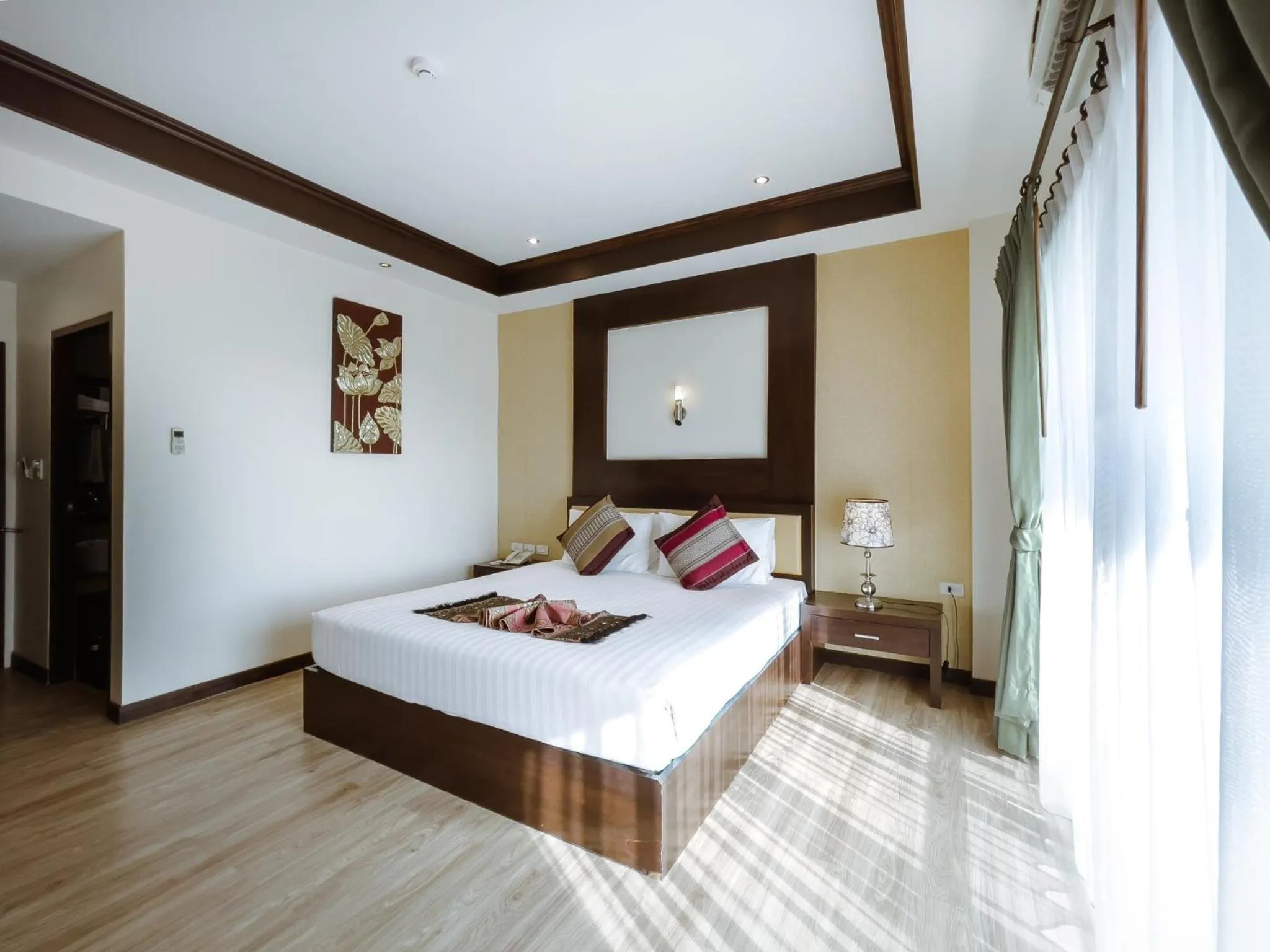 Bed in Royal Nakhara Hotel and Convention Centre