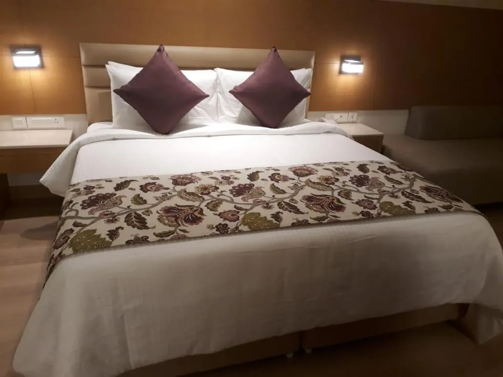 Bed in Nataraj Sarovar Portico