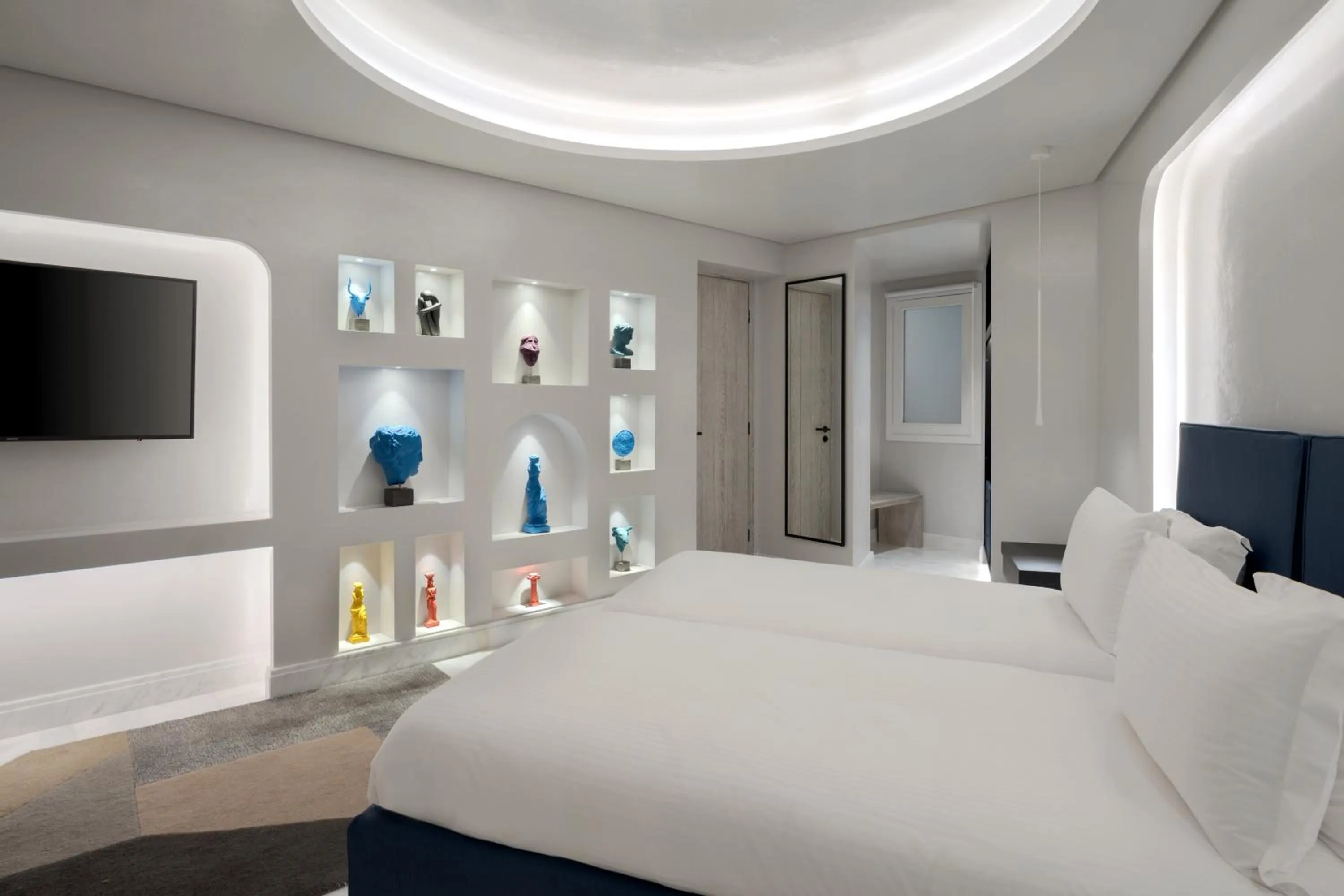 Bed in Mykonos Riviera Hotel & Spa, a member of Small Luxury Hotels of the World