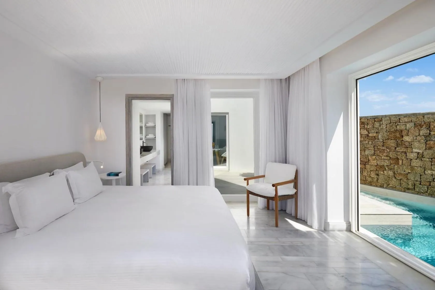 Bed in Mykonos Riviera Hotel & Spa, a member of Small Luxury Hotels of the World