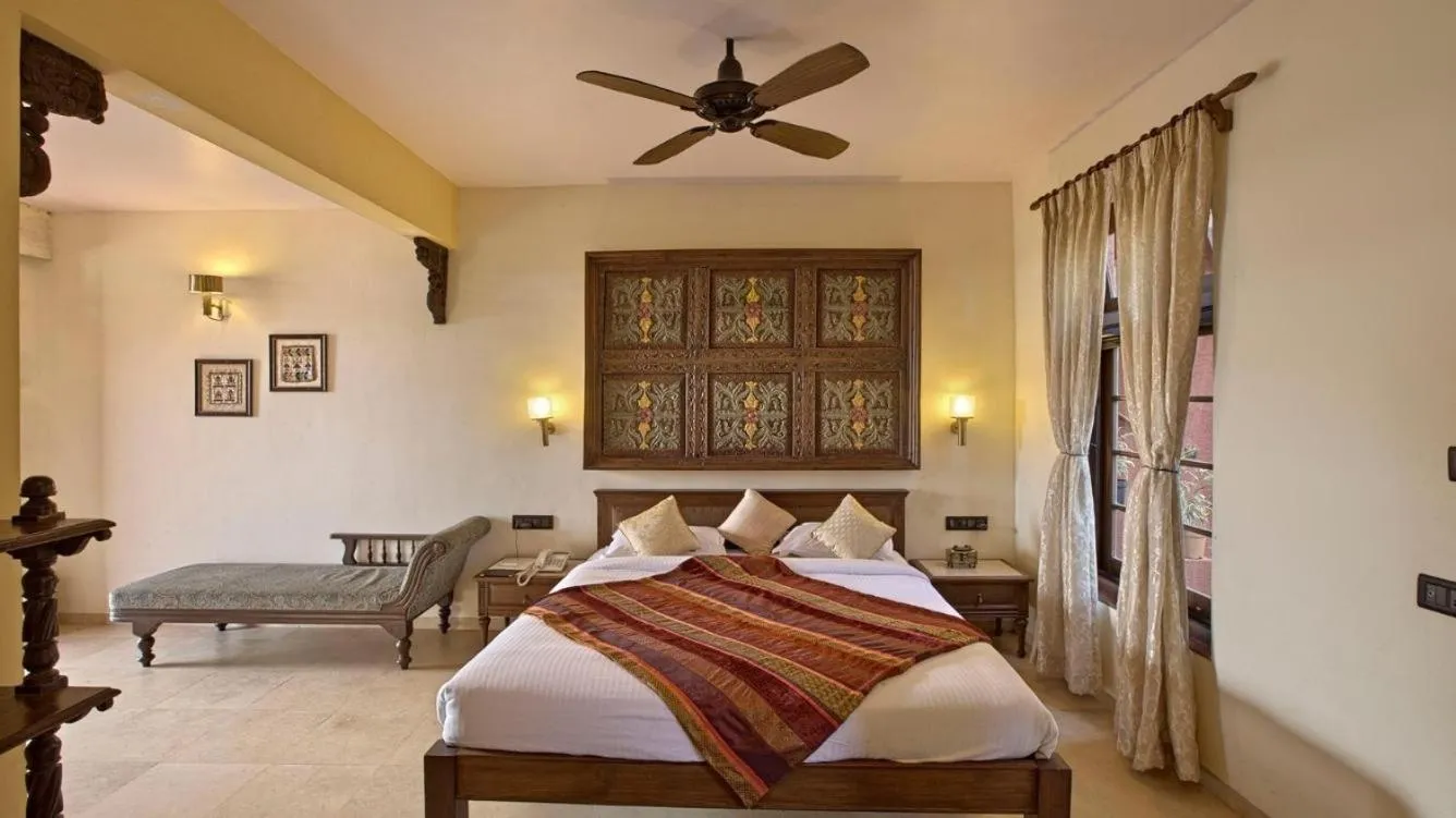 Bed in Ramsukh Resorts and Spa