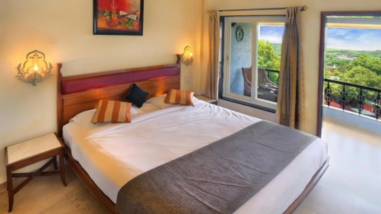 Bed in Ramsukh Resorts and Spa