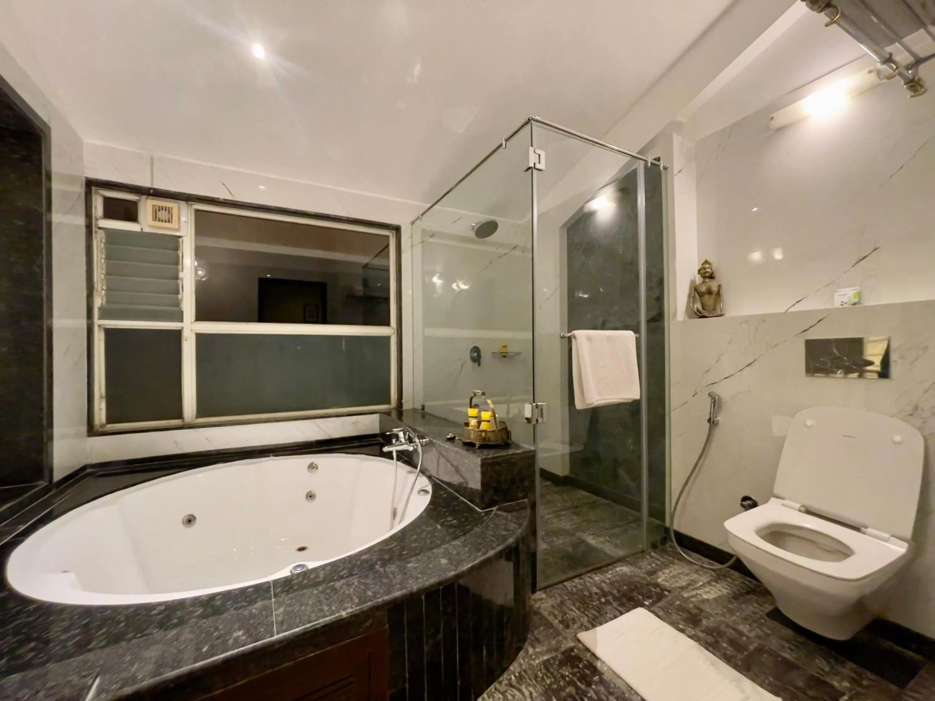 Shower in Ramsukh Resorts and Spa