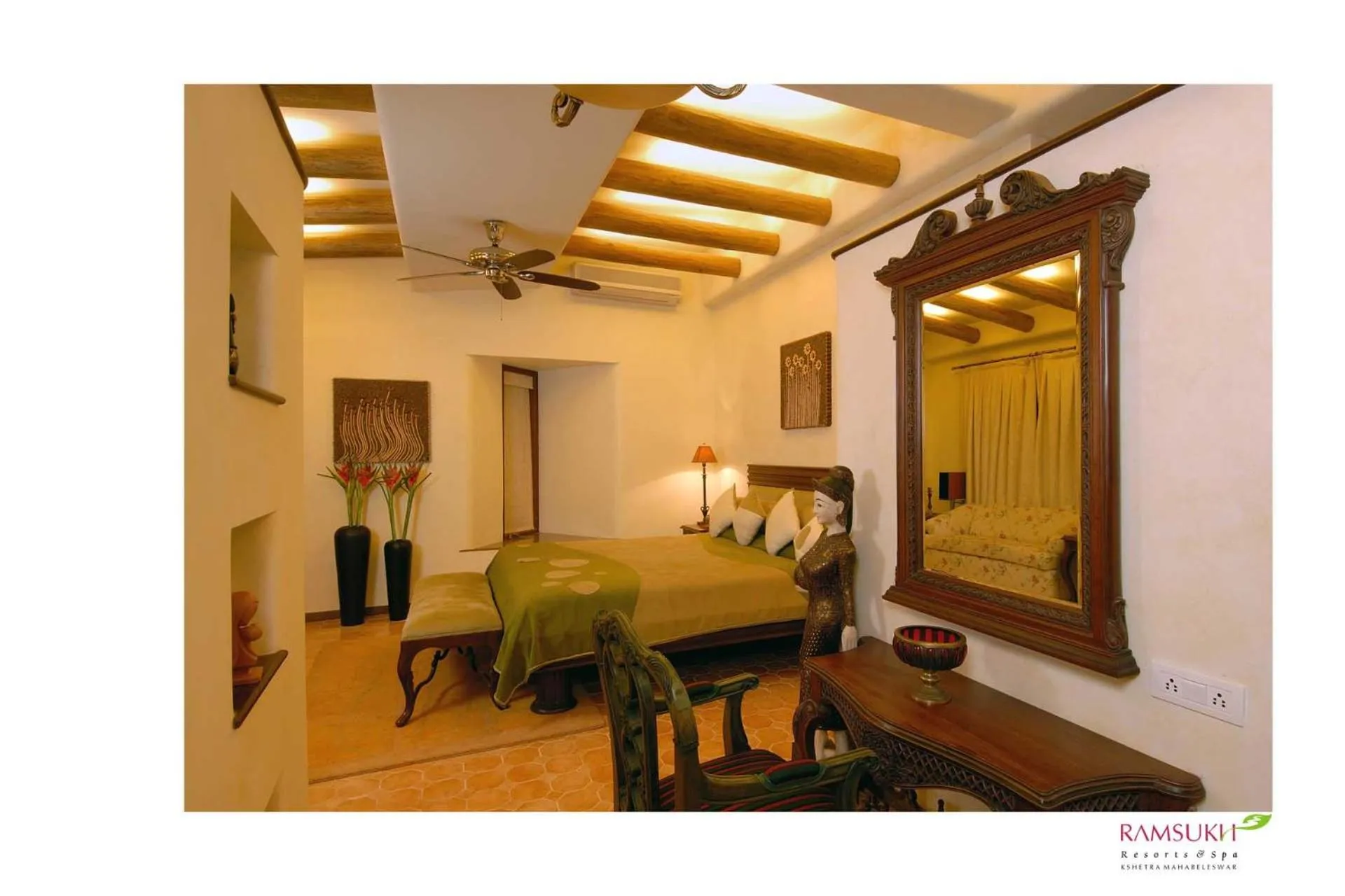 Bed in Ramsukh Resorts and Spa