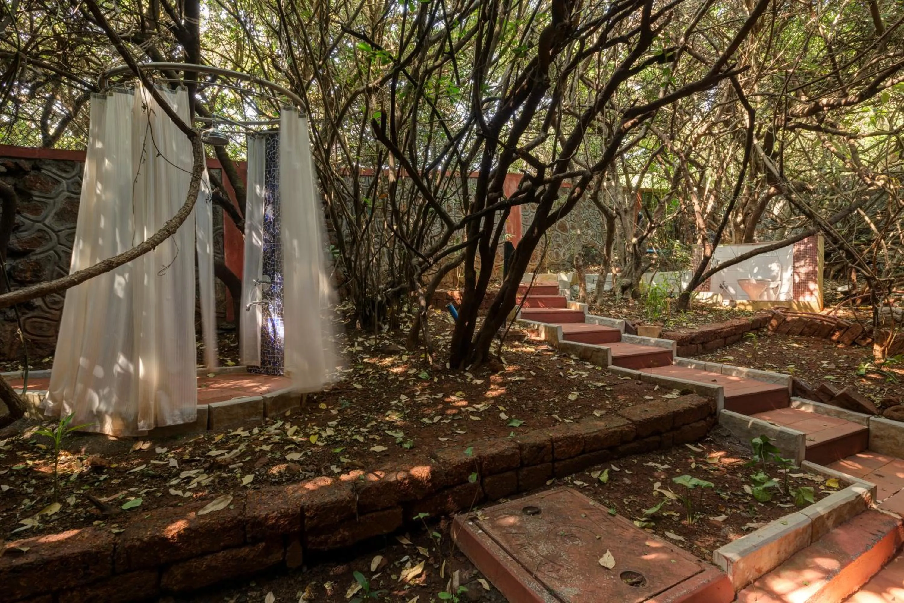 Shower in Ramsukh Resorts and Spa