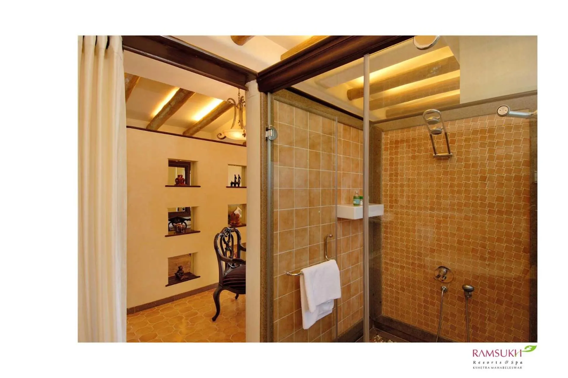 Shower in Ramsukh Resorts and Spa