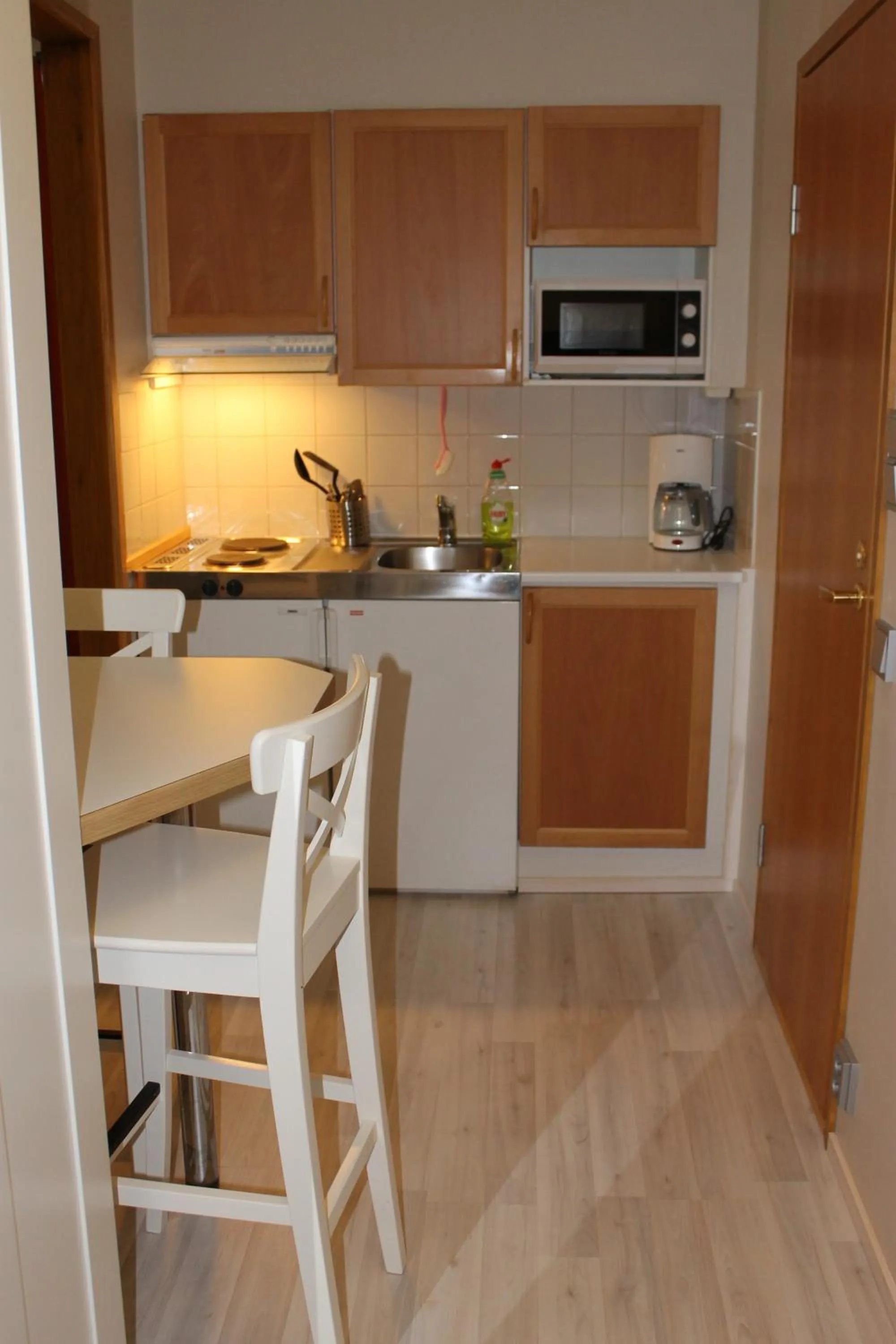 Kitchen or kitchenette in Motelli Jätkänkolo