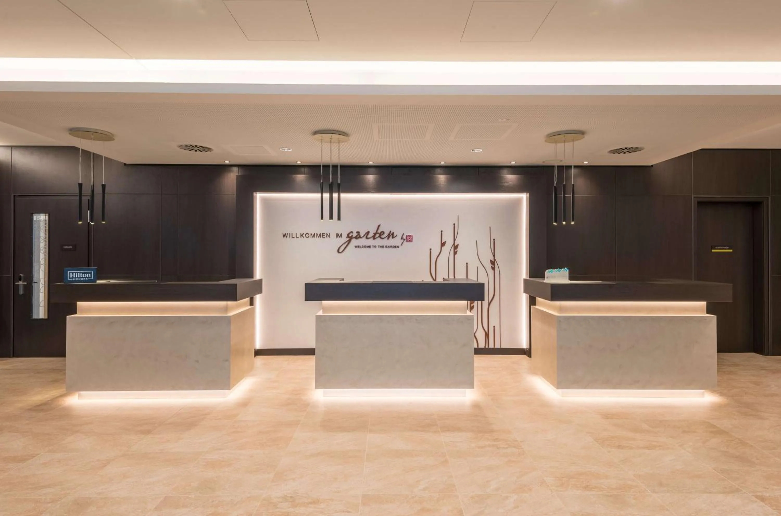 Lobby or reception in Hilton Garden Inn Munich City West
