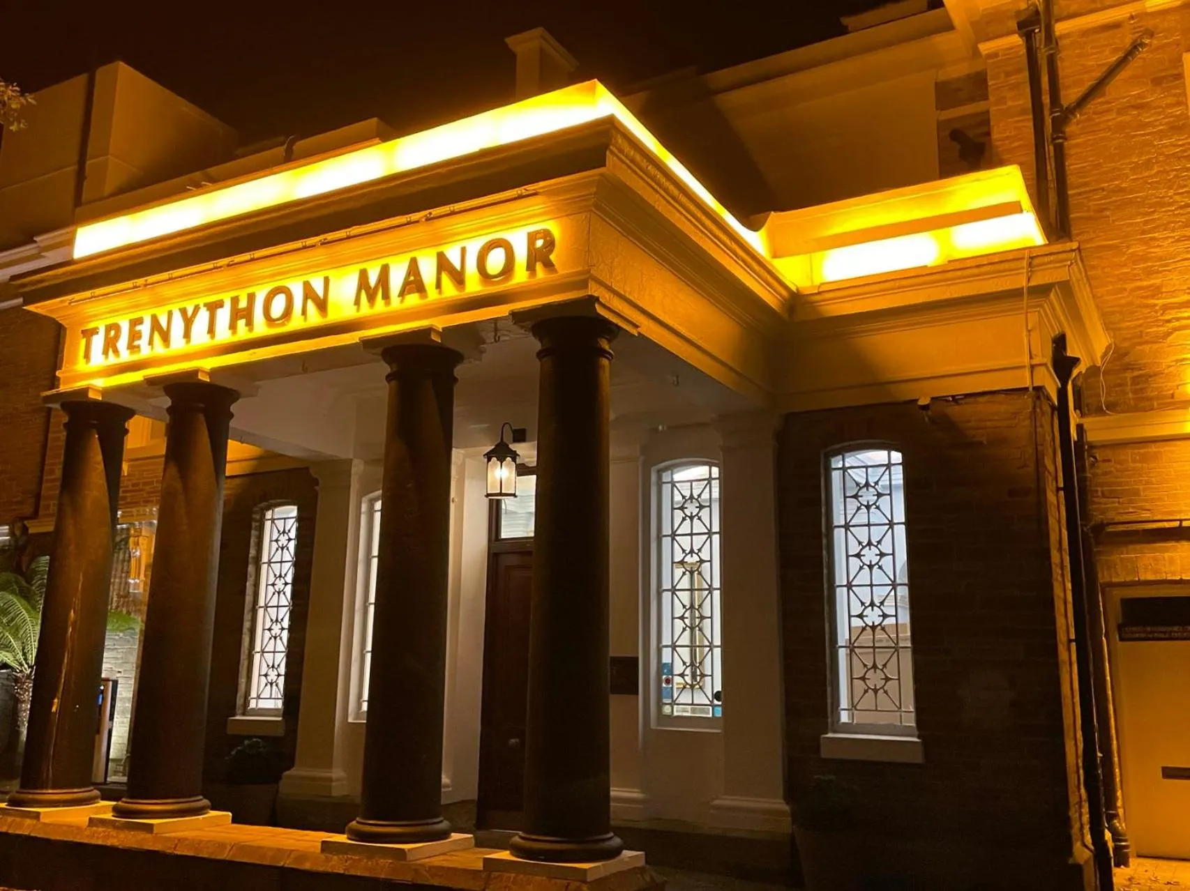 Property logo or sign in Trenython Manor Resort