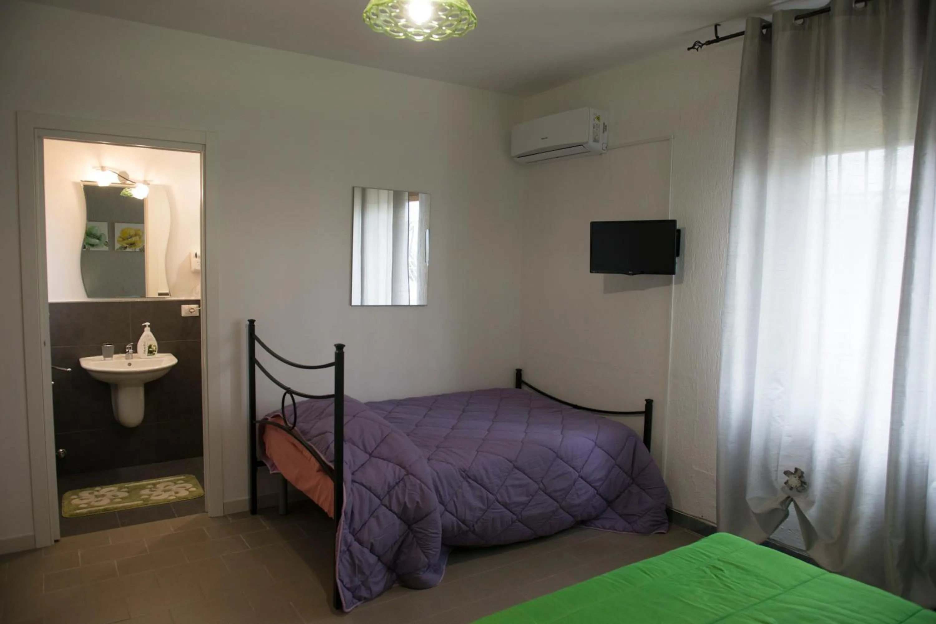 Bed in Villa Miriade B&b