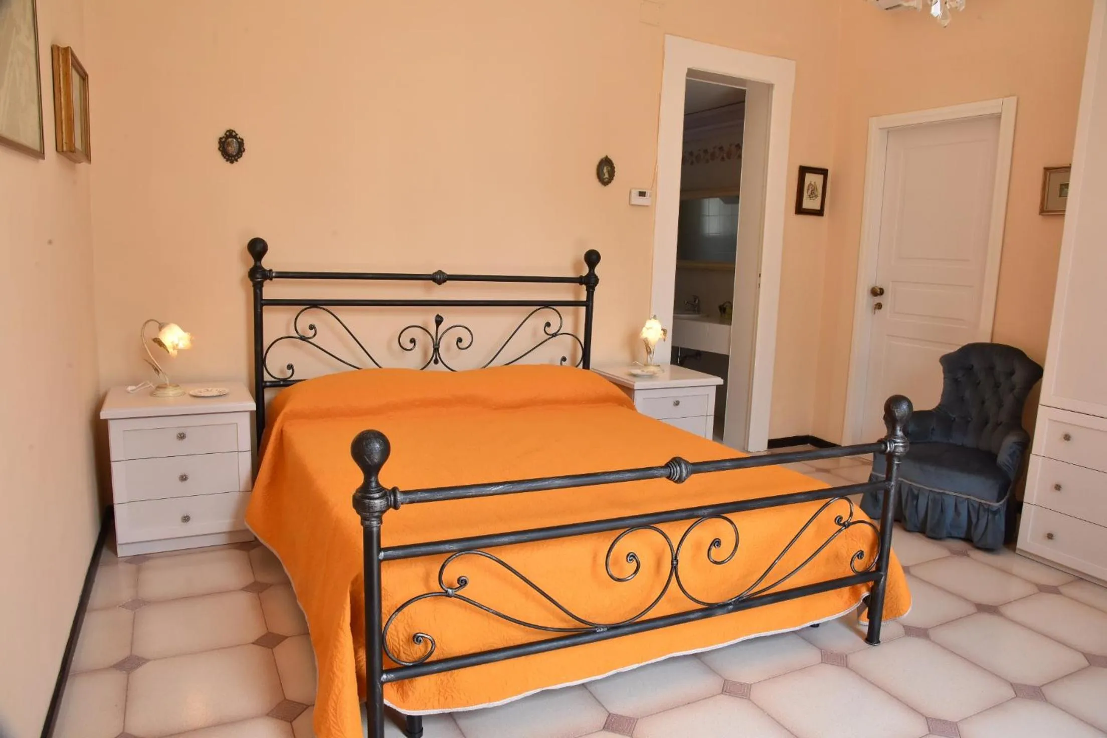 Bed in Rosaria Suite & Rooms