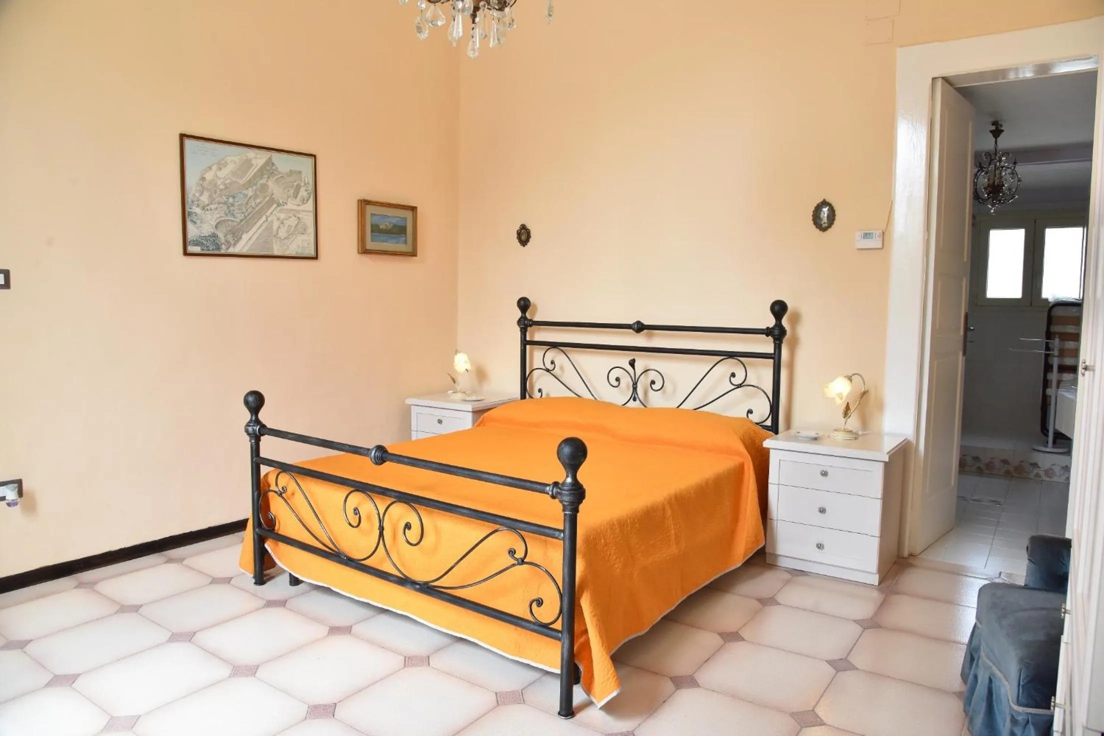 Bed in Rosaria Suite & Rooms