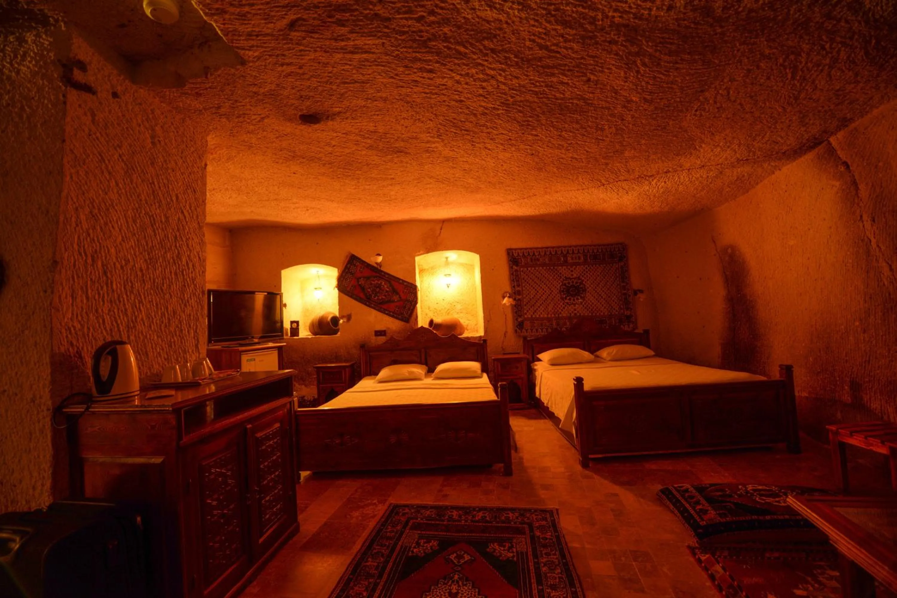 Bed in Vineyard Cave Hotel