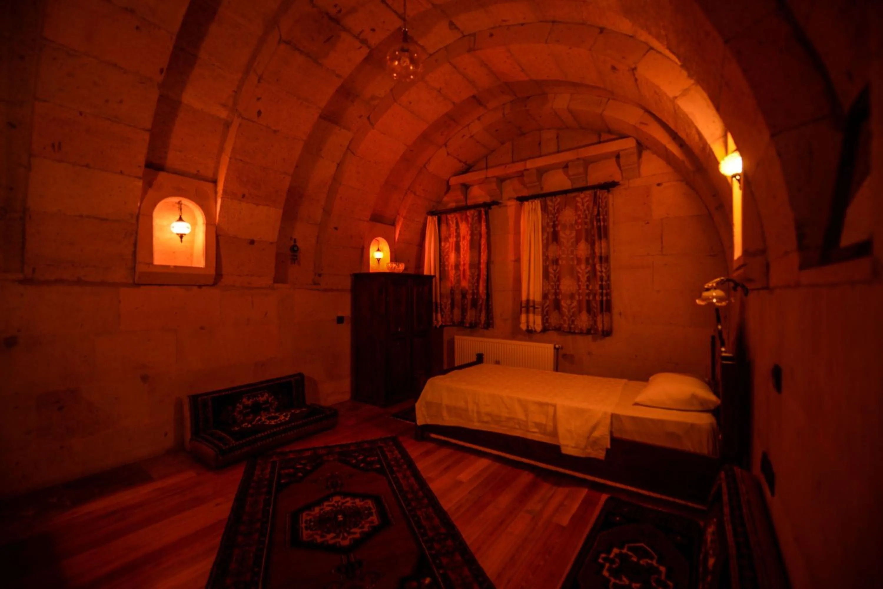 Bed in Vineyard Cave Hotel