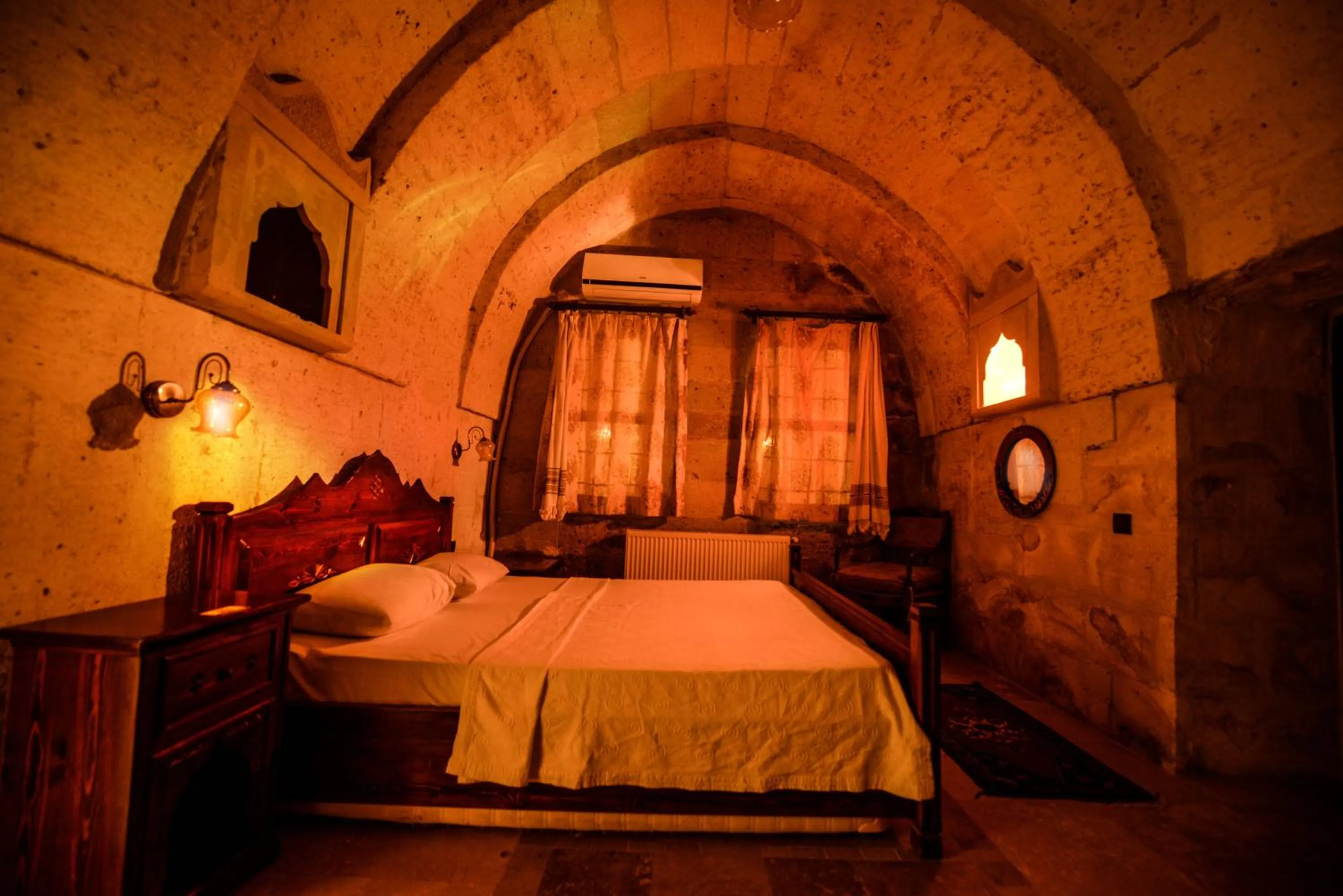Bed in Vineyard Cave Hotel