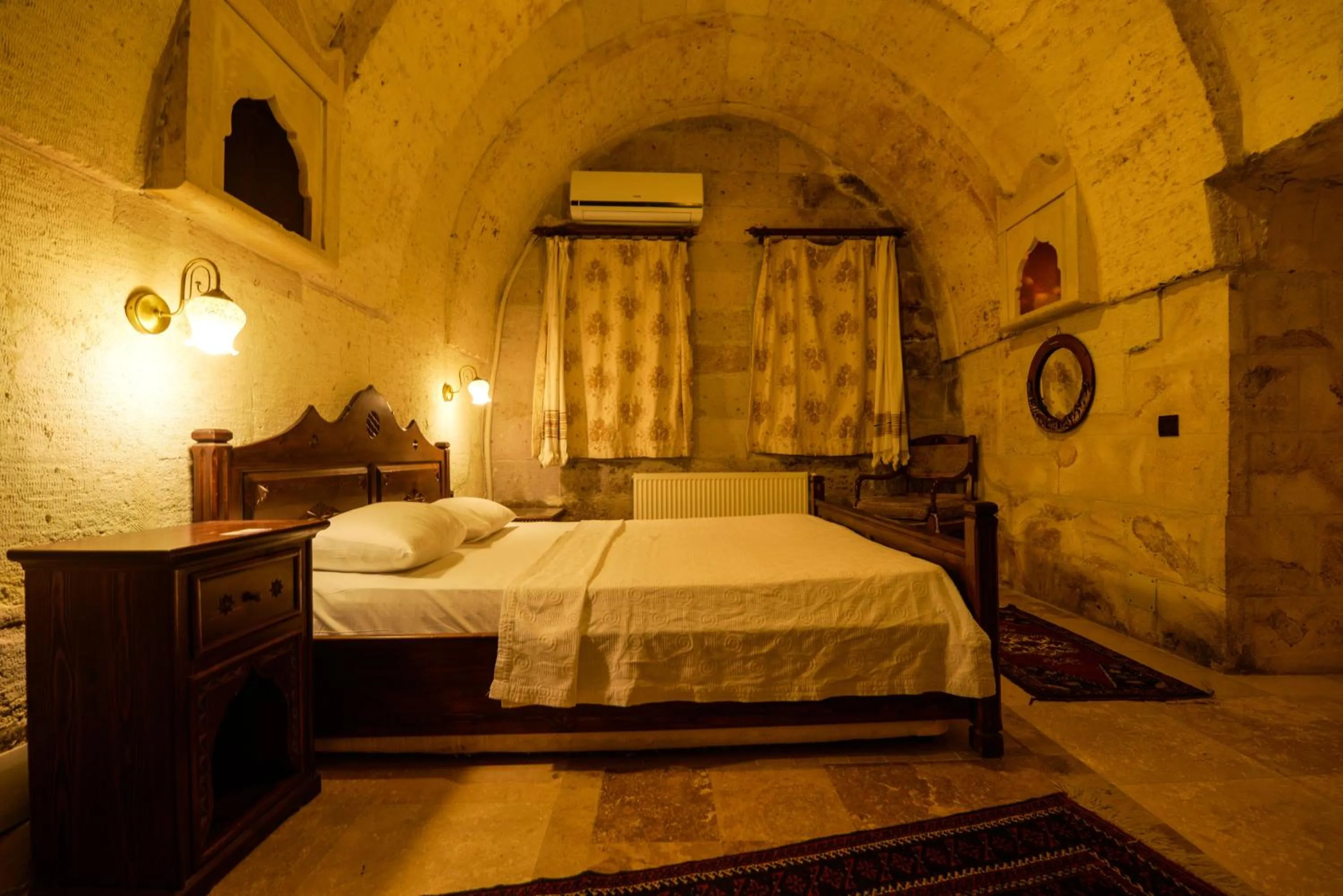 air conditioner, Bed in Vineyard Cave Hotel