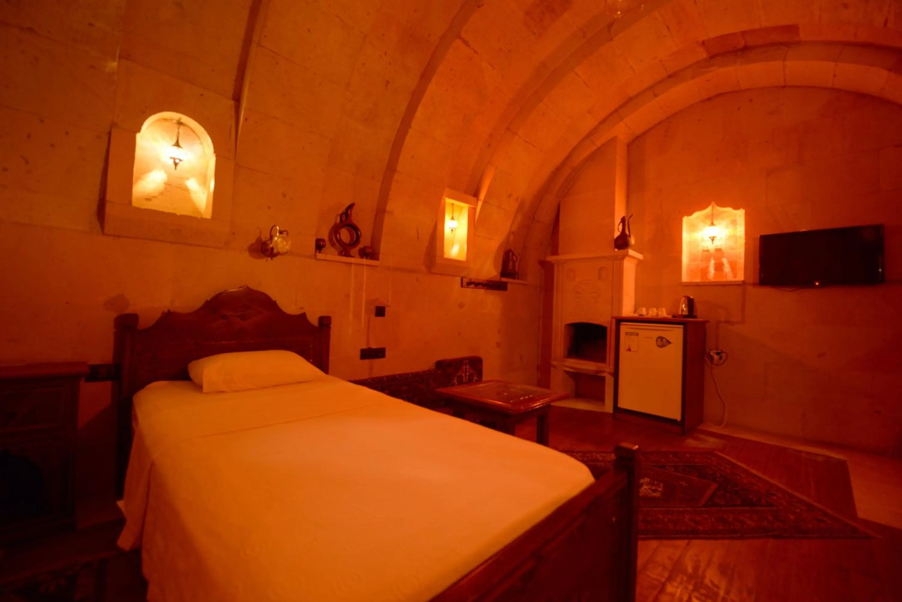 Bed in Vineyard Cave Hotel