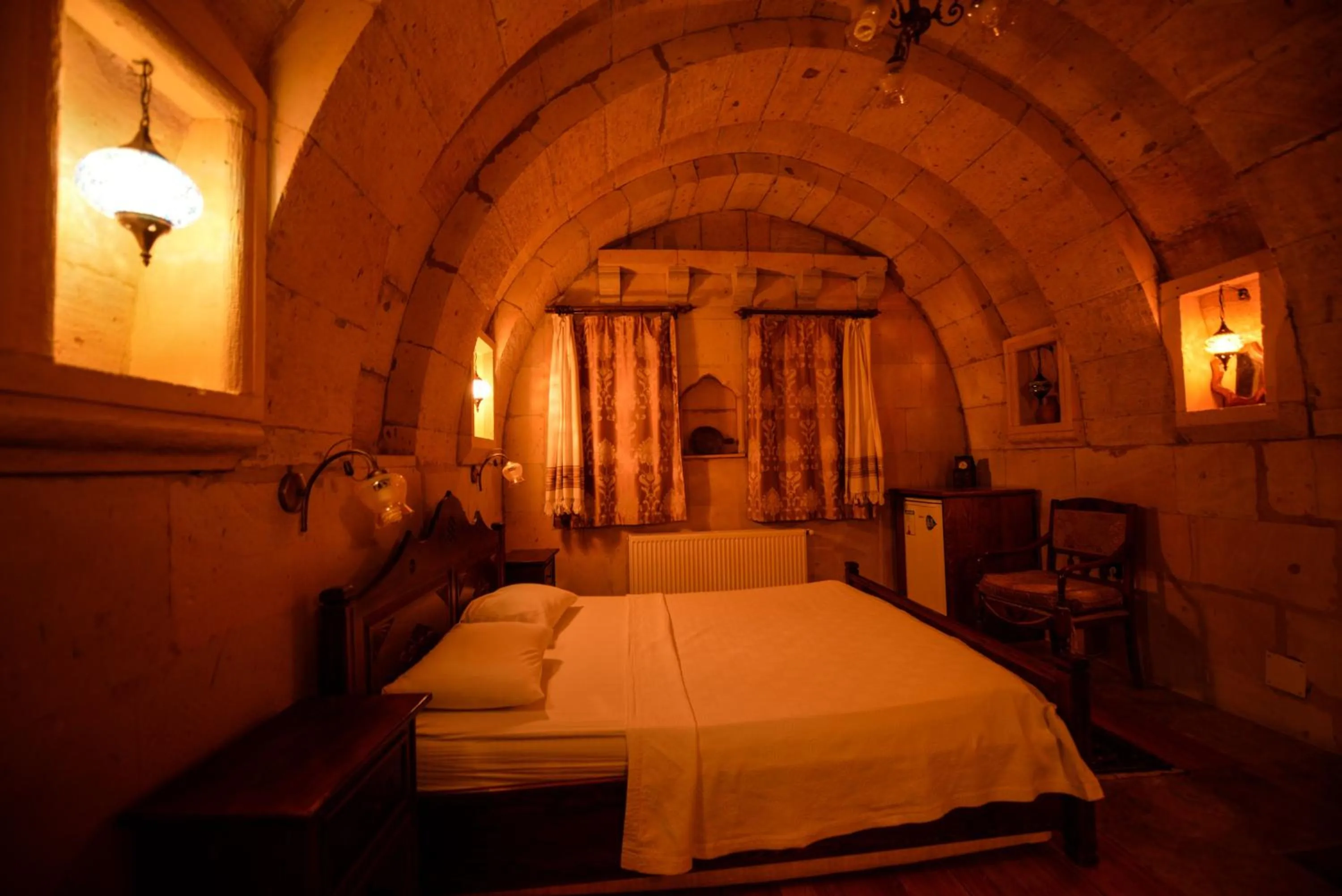 Bed in Vineyard Cave Hotel