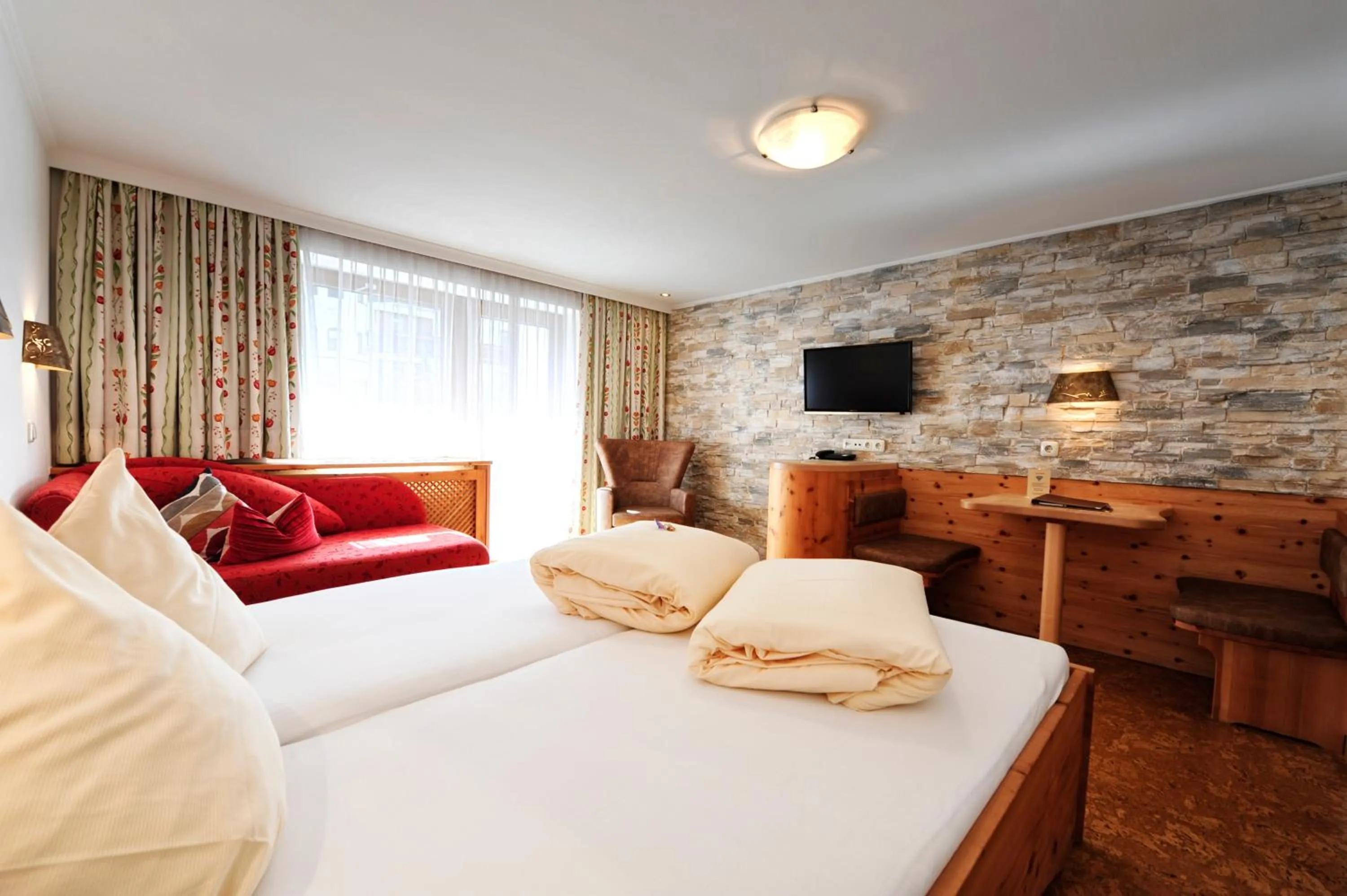 Photo of the whole room, Bed in Hotel Arnika