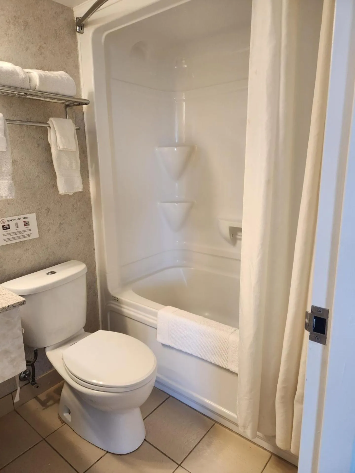 Bathroom in Travelodge by Wyndham Amherst