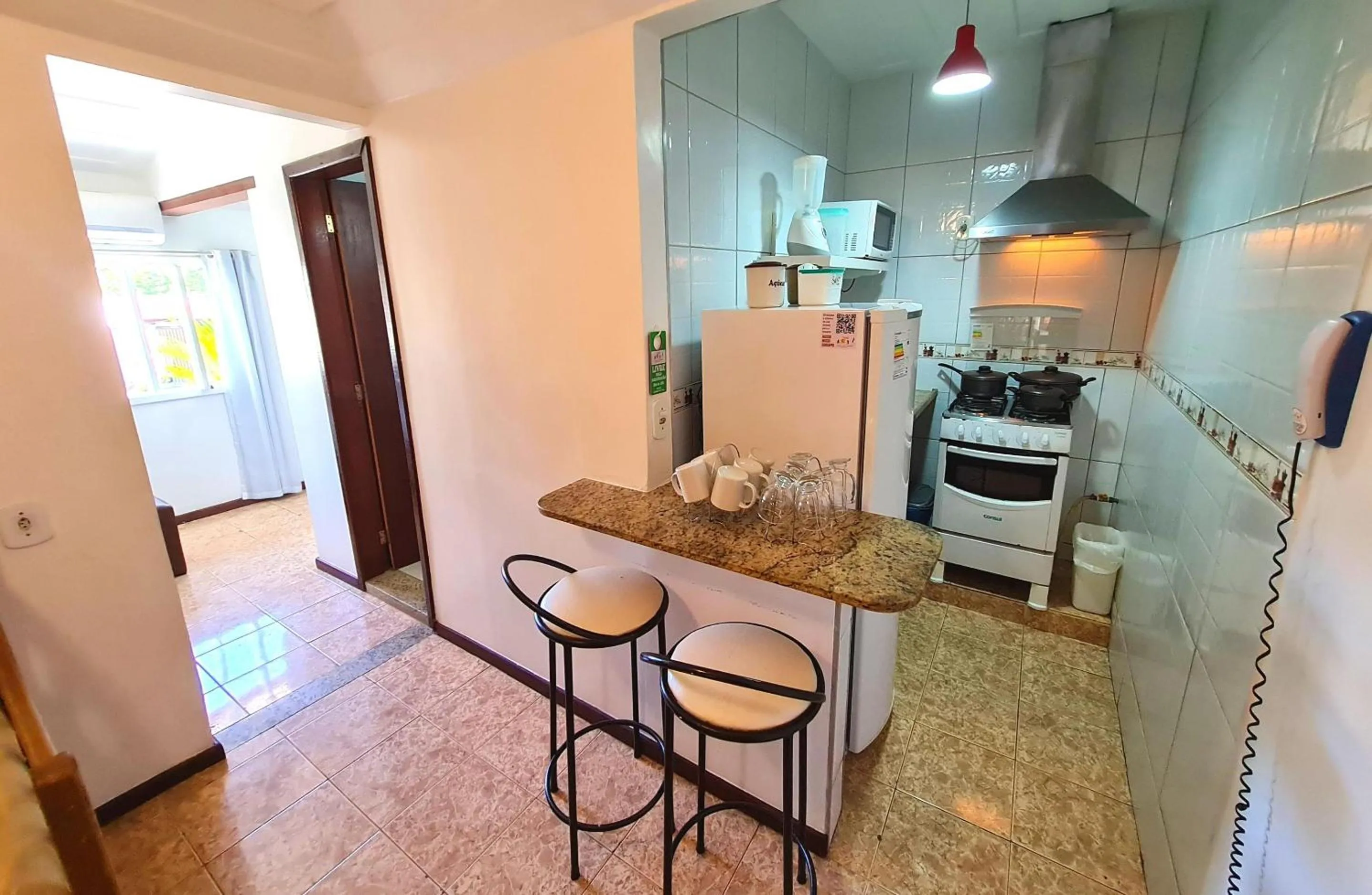 Kitchen or kitchenette in Pousada Solar de Geribá