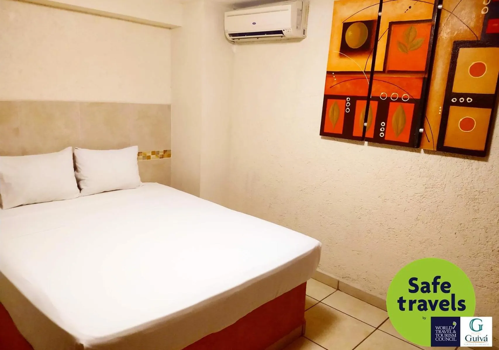 Bed in Hotel Guivá Huatulco