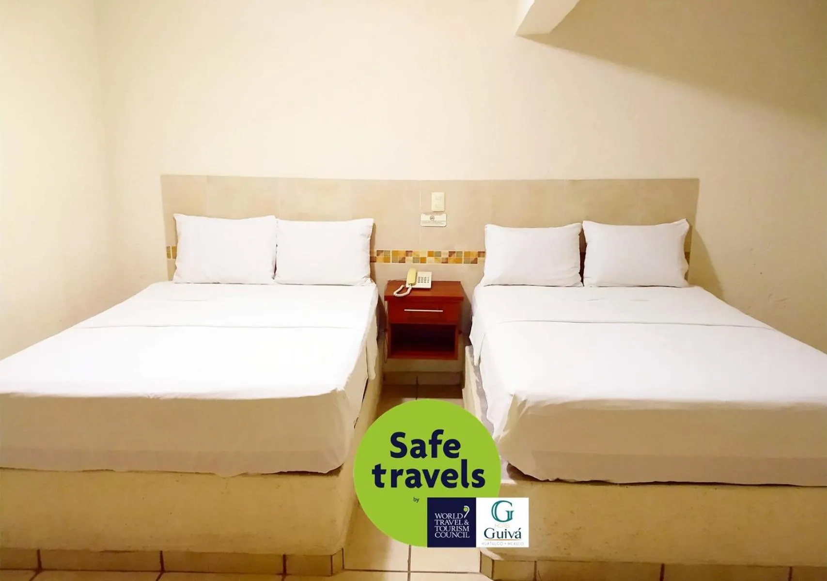 Bed in Hotel Guivá Huatulco