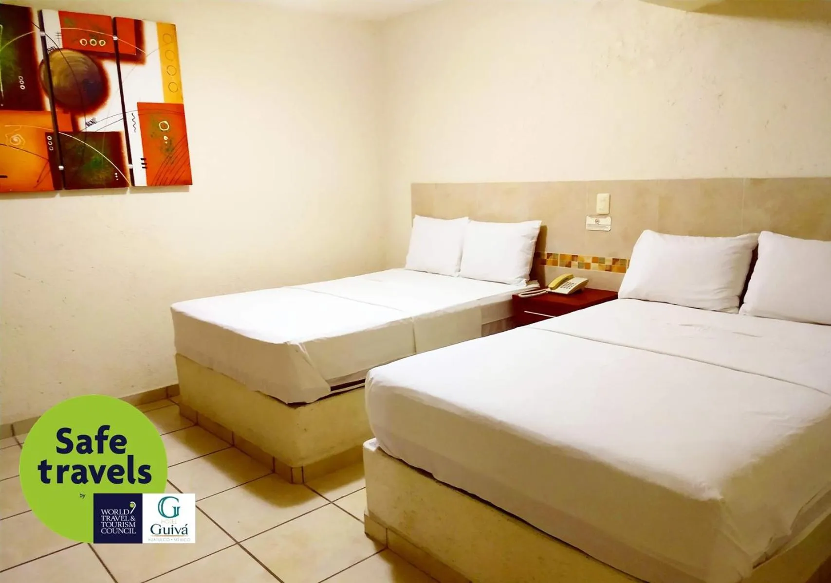 Bed in Hotel Guivá Huatulco