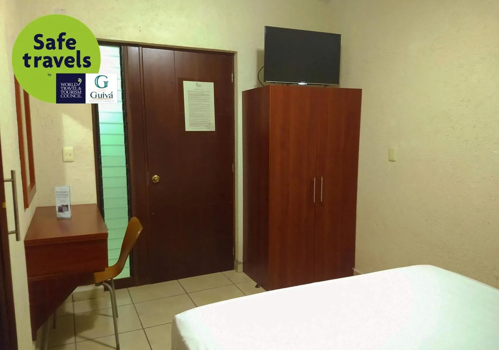 Bed in Hotel Guivá Huatulco